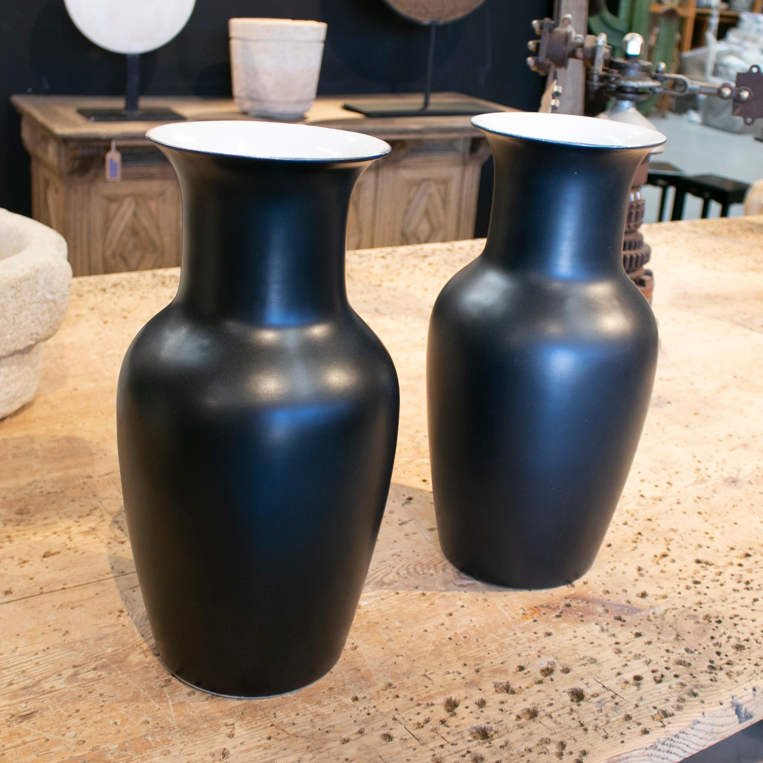 1990s pair of Spanish black matte finish ceramic vases.