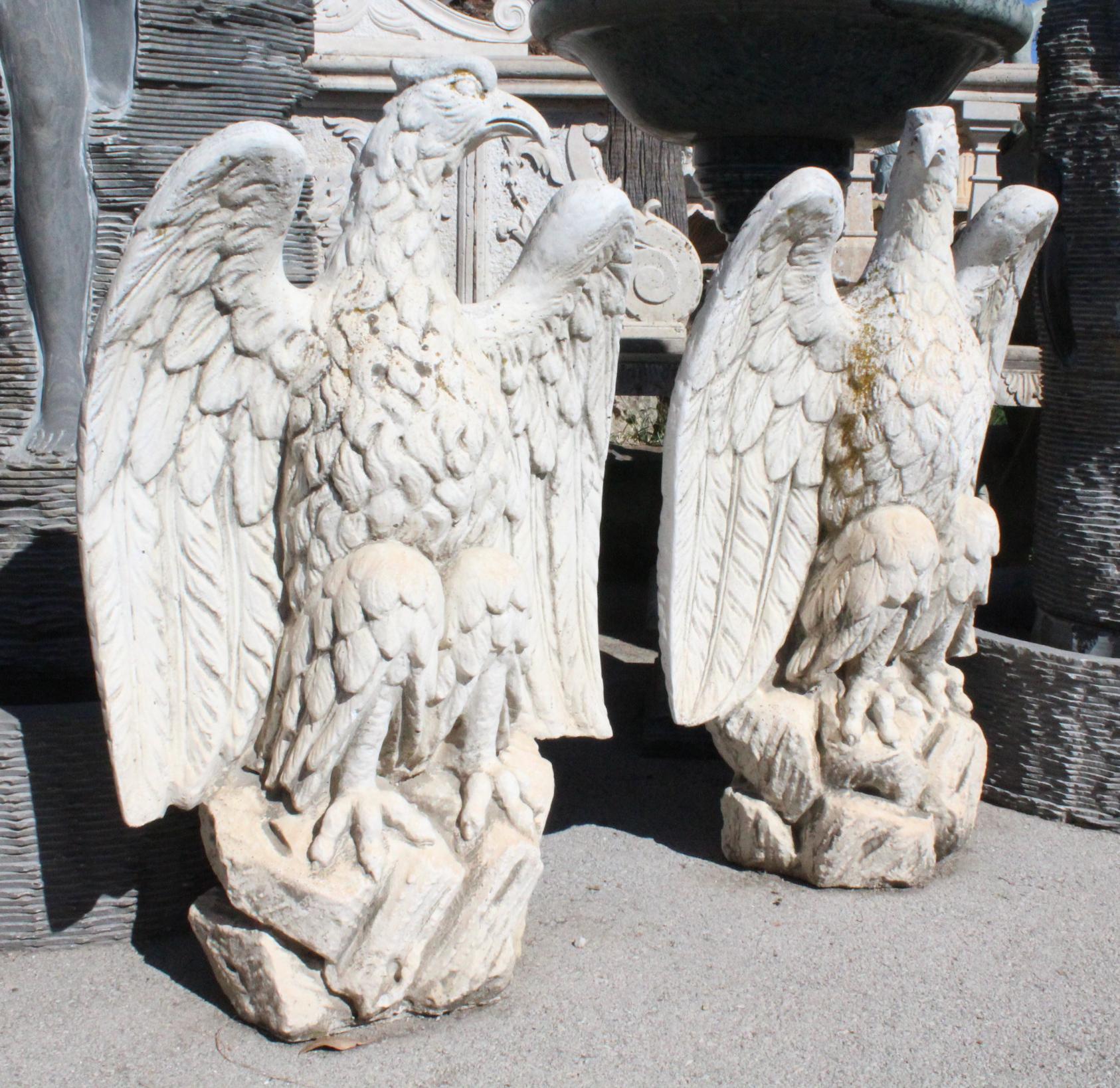1990s pair of Spanish reconstituted stone eagles.