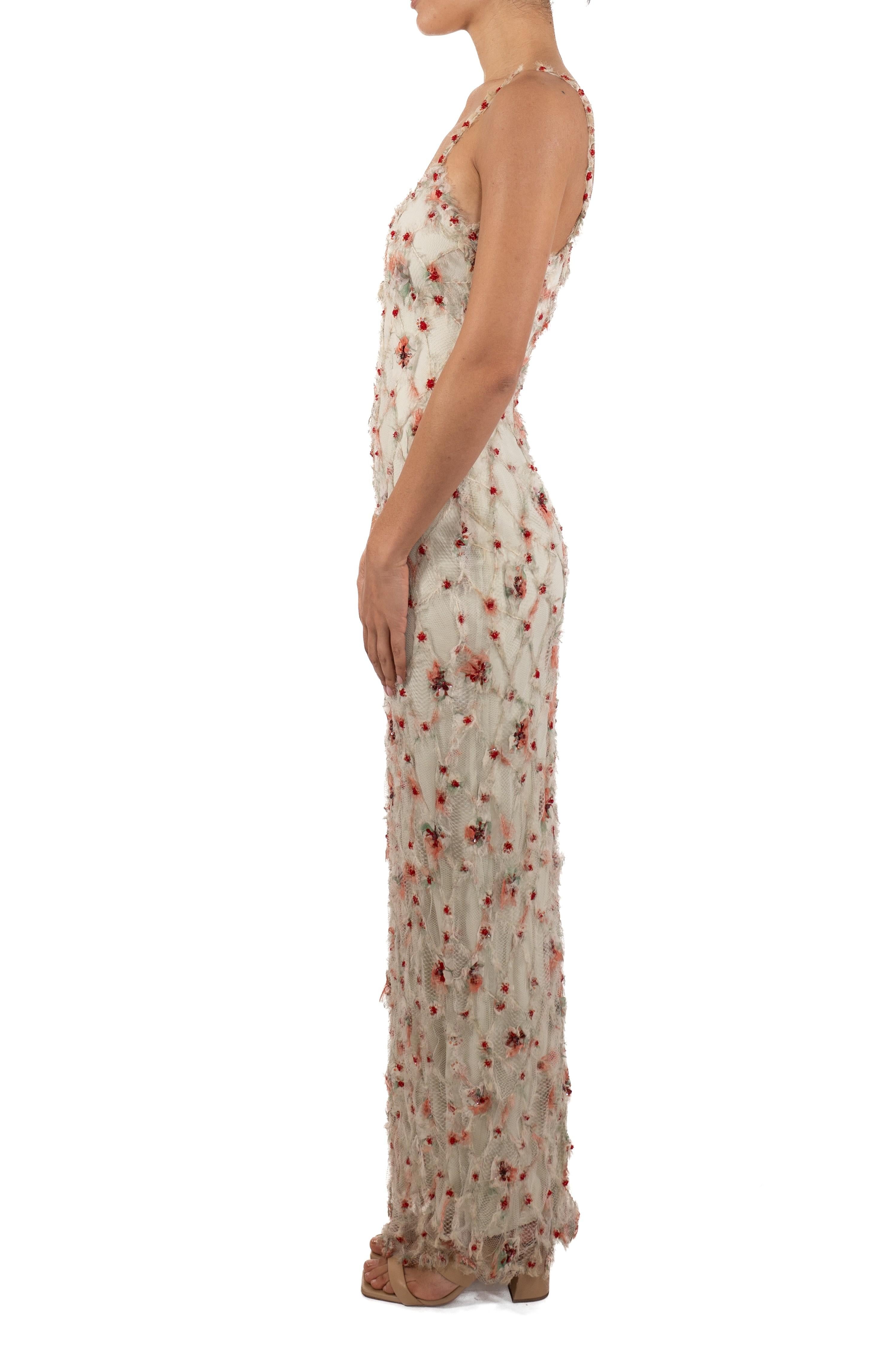 This gown retains no label, however the amount of hand-finishing points to Haute Couture or custom made quality, fully lined in silk. 1990S Pastel Mint Green & Red Shredded Silk Chiffon Chantilly Lace Crystal Beaded Gown 