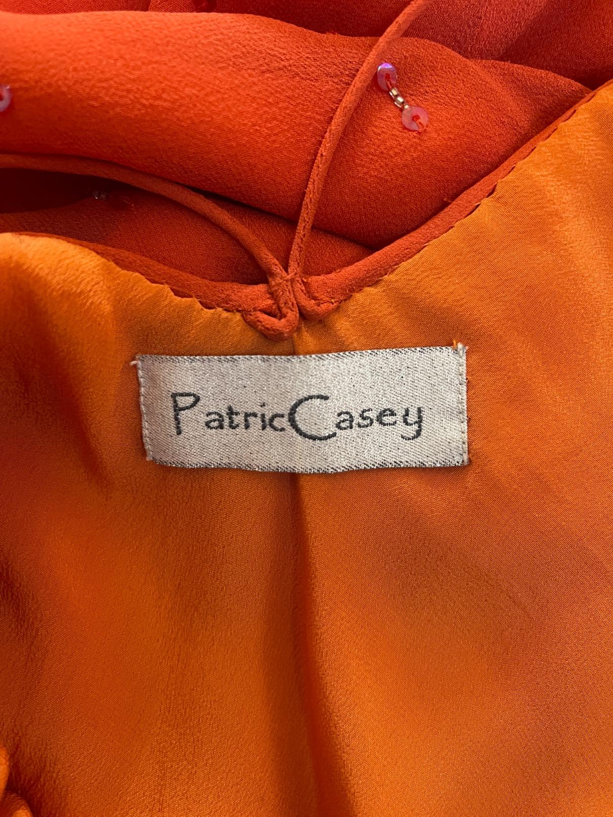 Patric Casey, un abito in seta arancione profondo con taglio in sbieco e perline, anni '90. in vendita 3
