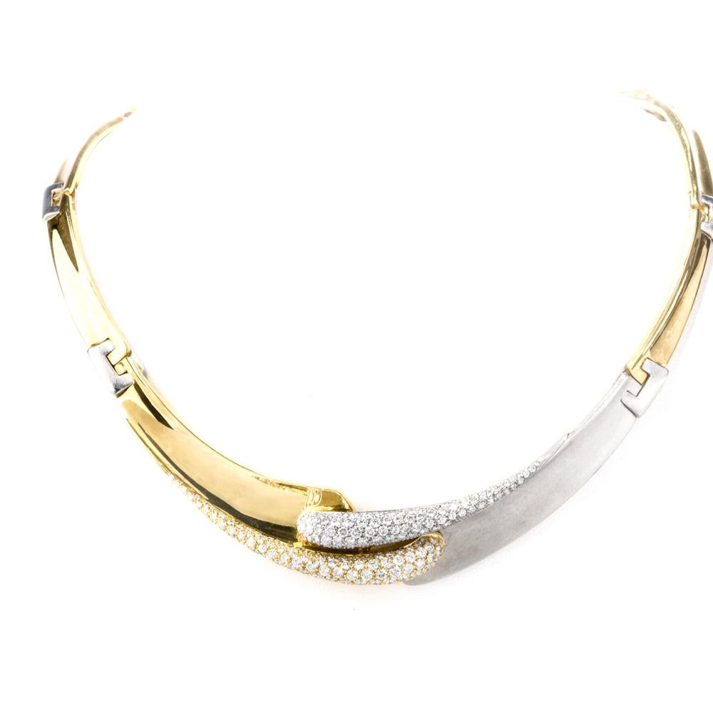 This timelessly elegant 1990’s vintage choker necklace is of Italian provenance, crafted in a combination of 18 karat yellow and white gold, weighs 103 grams and measures 16.5 inches long x 17 mm max. wide at the center. This artfully designed