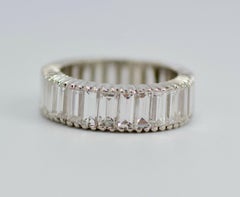 1990s Platinum Baguette Cut Diamond 3 Carat Eternity Band Ring