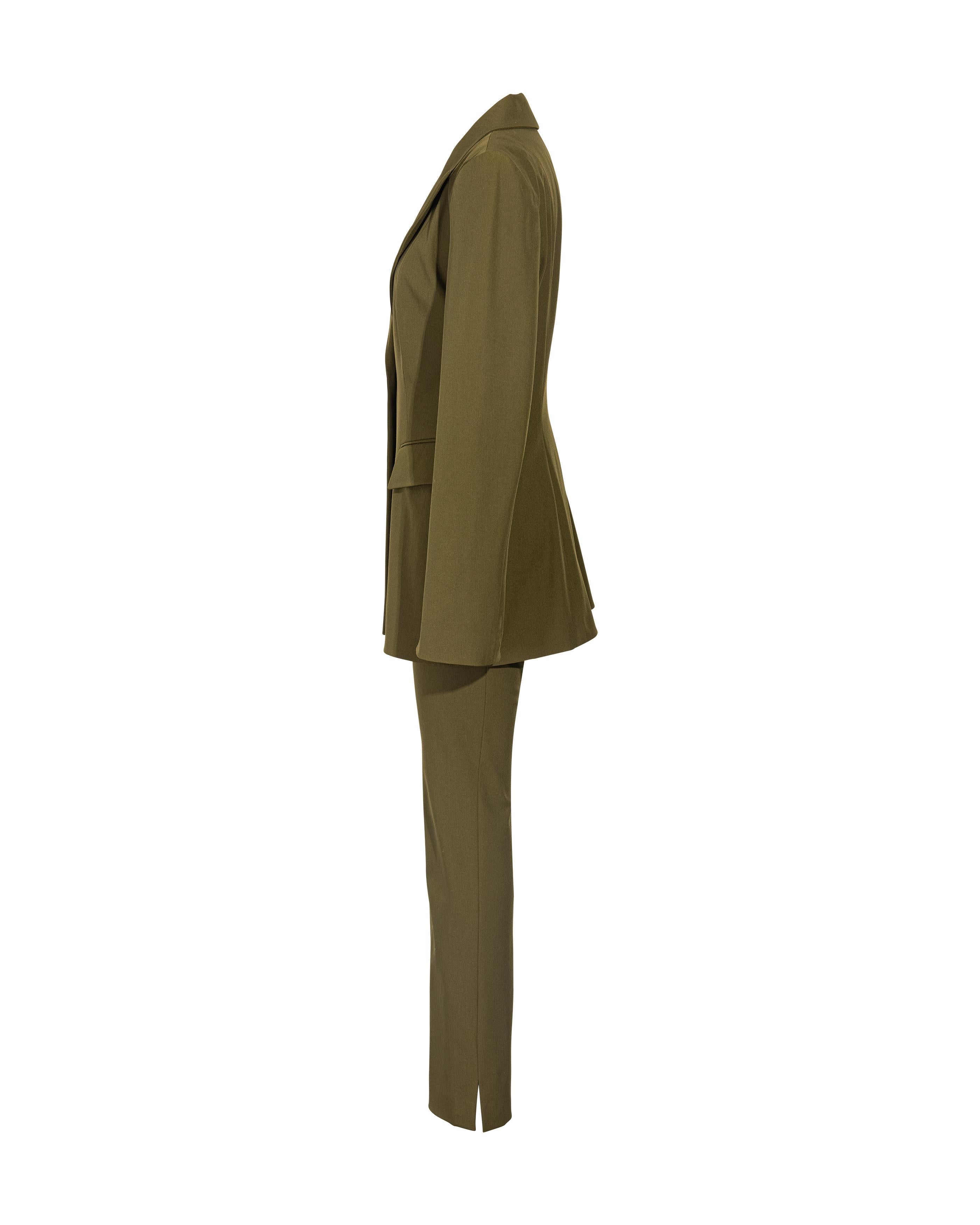 1990's Plein Sud olive green pant suit set. Fitted blazer and mid to high-rise cigarette pant. Single button closure. Slight stretch to material allows for extra comfort when wearing. 

Measurements
Marked size 10; best fits size US 8 -