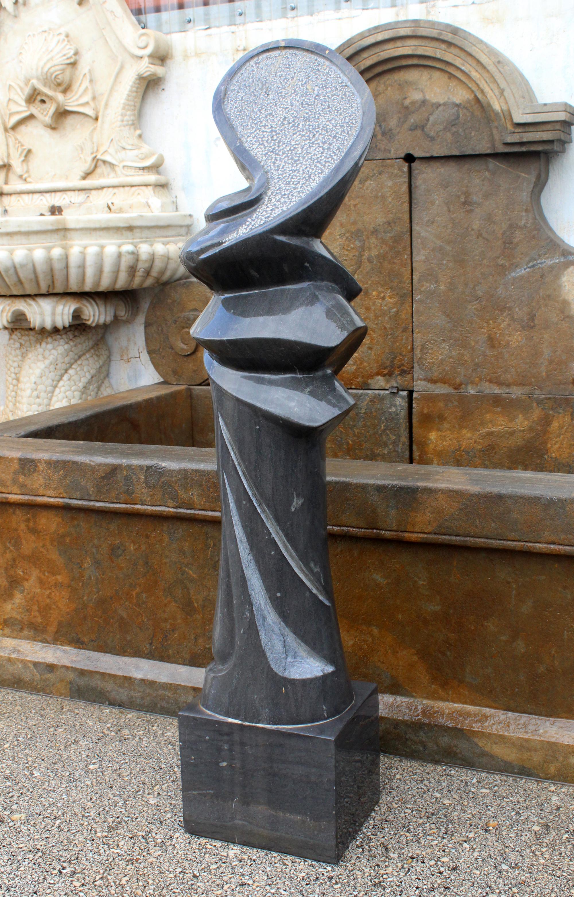 1990s polished modern abstract sculpture in pure Belgian black marble.