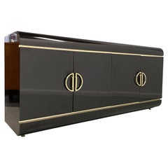 1990s Post Modern Black Laminate Rounded Credenza with Brass Handles and Trim