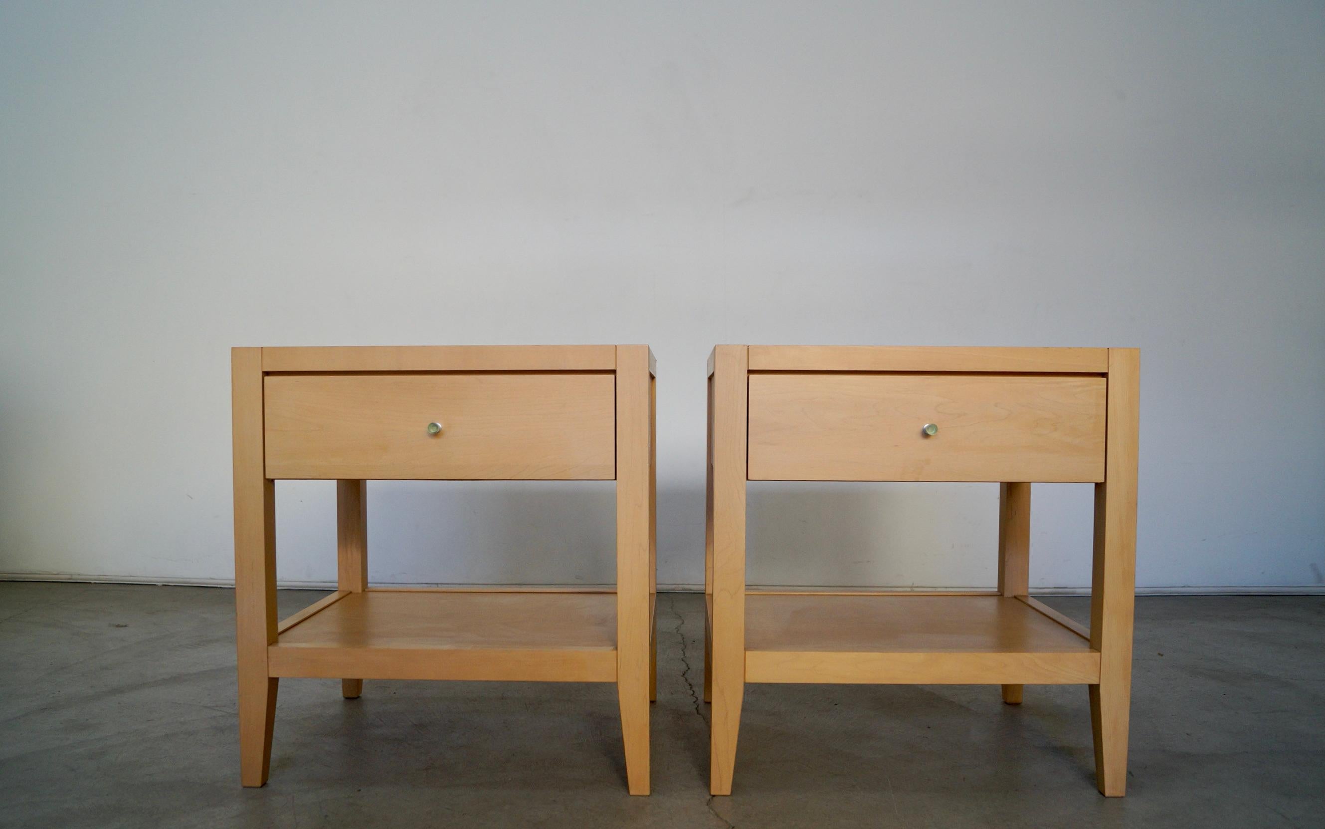 Pair of vintage post-modern night stands for sale. Manufactured by the high-end Baronet Furniture company, and made in Canada. These are dated back to 1998, and have a stamp in the drawer. They are really high-quality pieces with a Mid-century