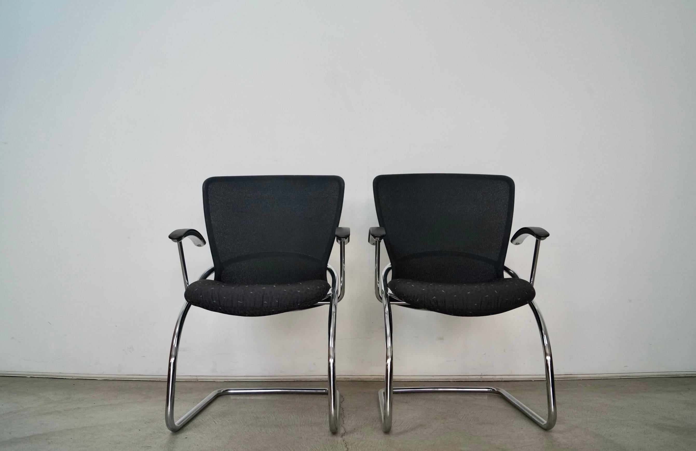 Vintage Postmodern pair of armchairs for sale. These were manufactured by design company Konig + Neurath in 1999, and are the Diva chairs. They were made in Germany, and have a Bauhaus flare. They are in excellent condition, and have a Herman Miller