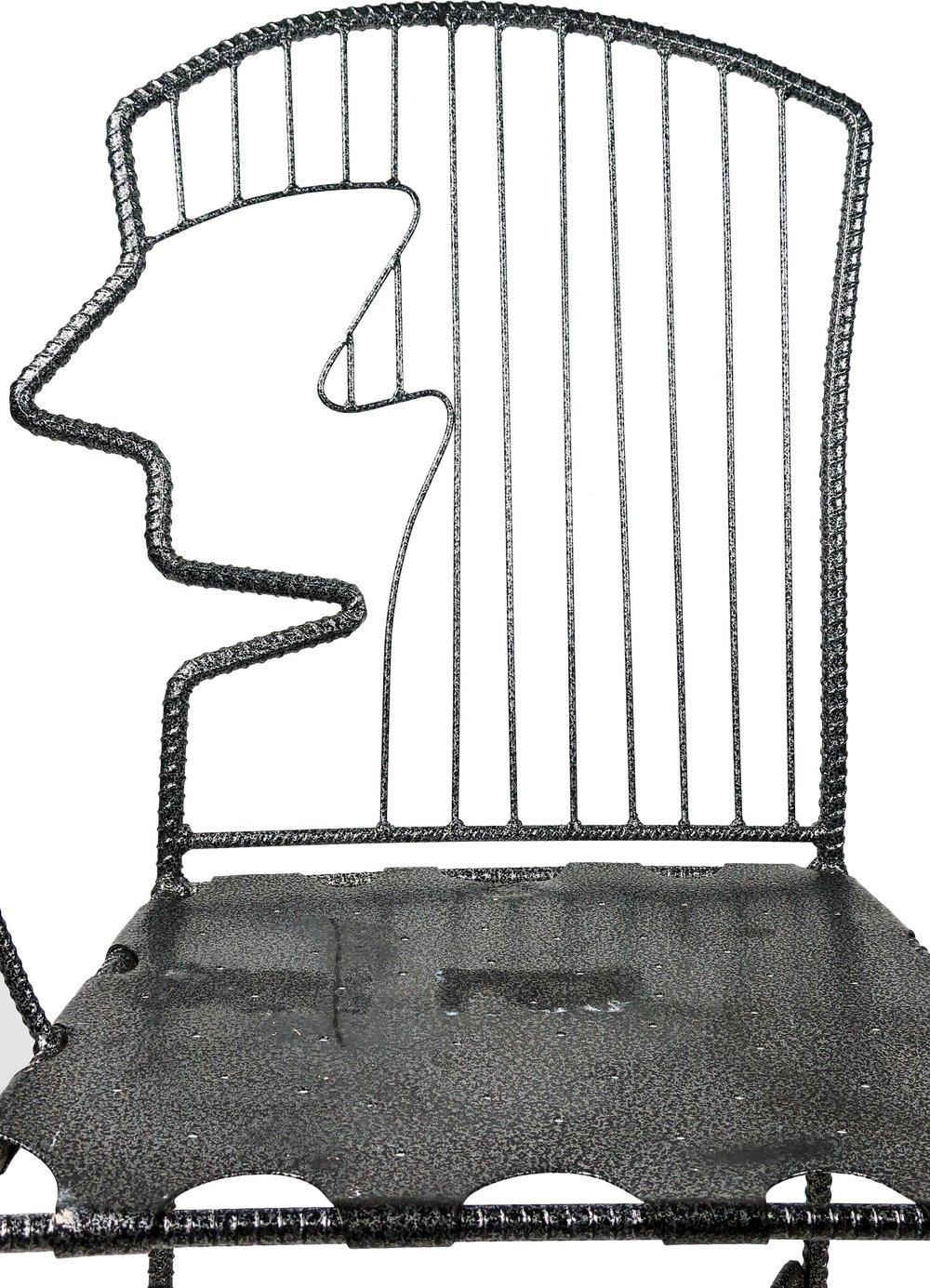 A unique John Risley-inspired postmodern arm chair handmade by Ries Niemi, an artist and craftsman who creates sculptures and public installations using industrial fabrication techniques and industrial materials. Niemi’s Head Chairs series is part