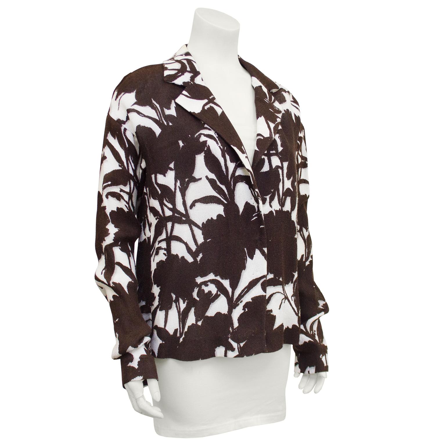1990's Prada linen relaxed fit jacket. All over floral print in contrasting chocolate brown and cream. Notched collar, dropped shoulders and elongated sleeves. Unlined. Excellent vintage condition.  Perfect spring and summer transition piece. Closes