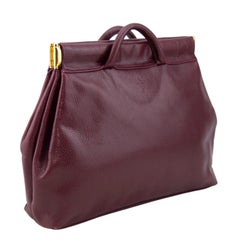 1990s Prada Maroon Leather Clutch with Small Handles