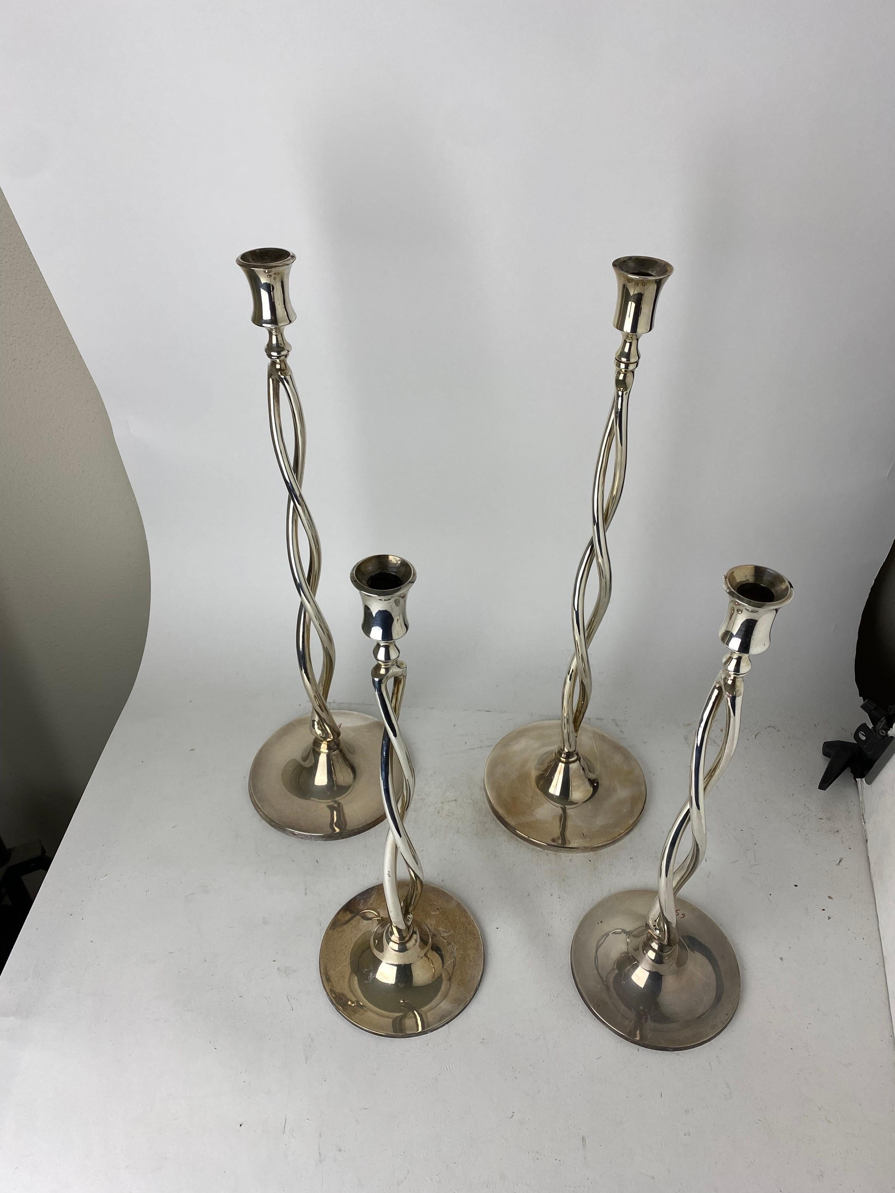 Fantastic set of 4 silver plated candle holders, marked 