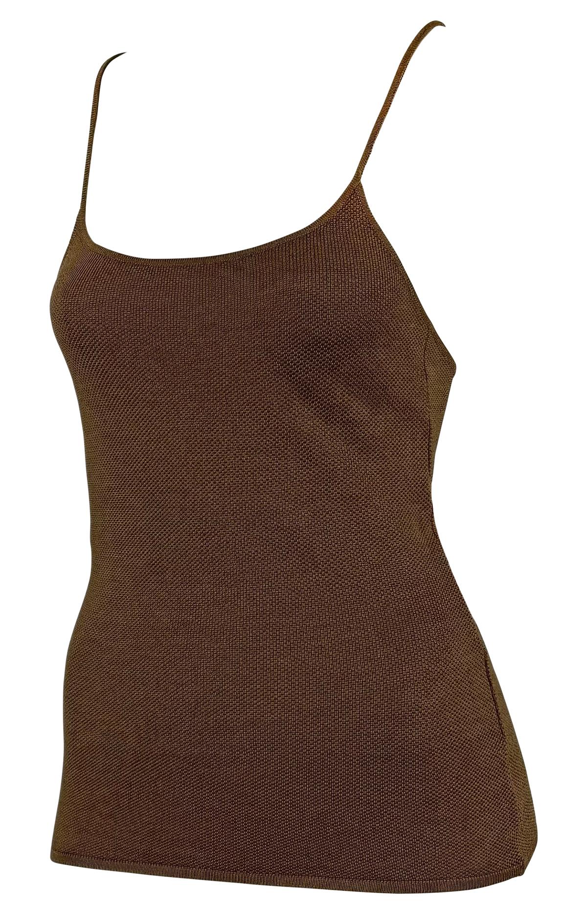From Ralph Lauren’s 1990s Purple Label collection, this brown silk knit tank top features a sheer, lightweight construction with a delicate stretch fit and ultra-thin straps that cross at the back, creating an open, backless design. 

Approximate