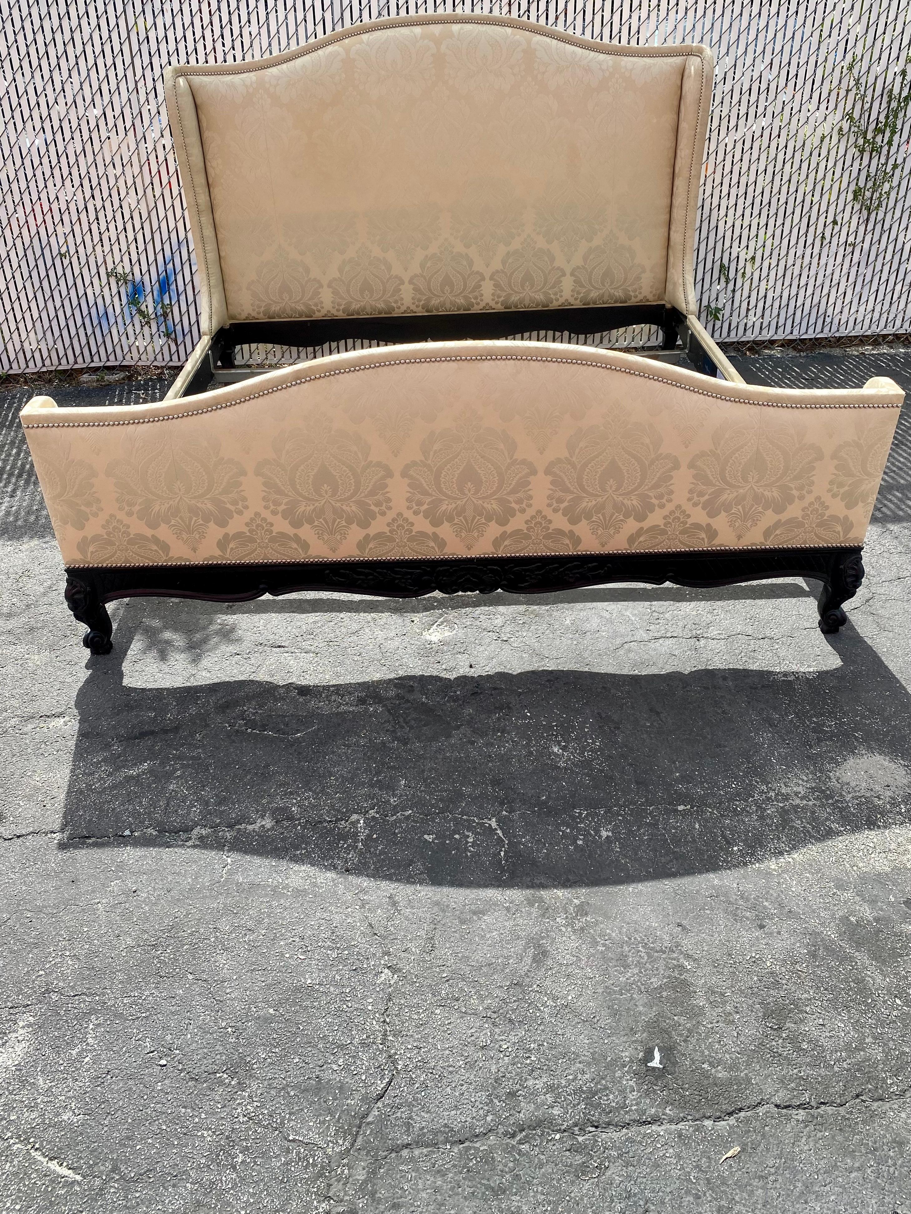 On offer on this occasion is one of the most stunning, Ralph Lauren Damask bed frame you could hope to find. Outstanding design is exhibited throughout. The beautiful bed frame with ebony hand carved wood and nailhead is statement piece and packed