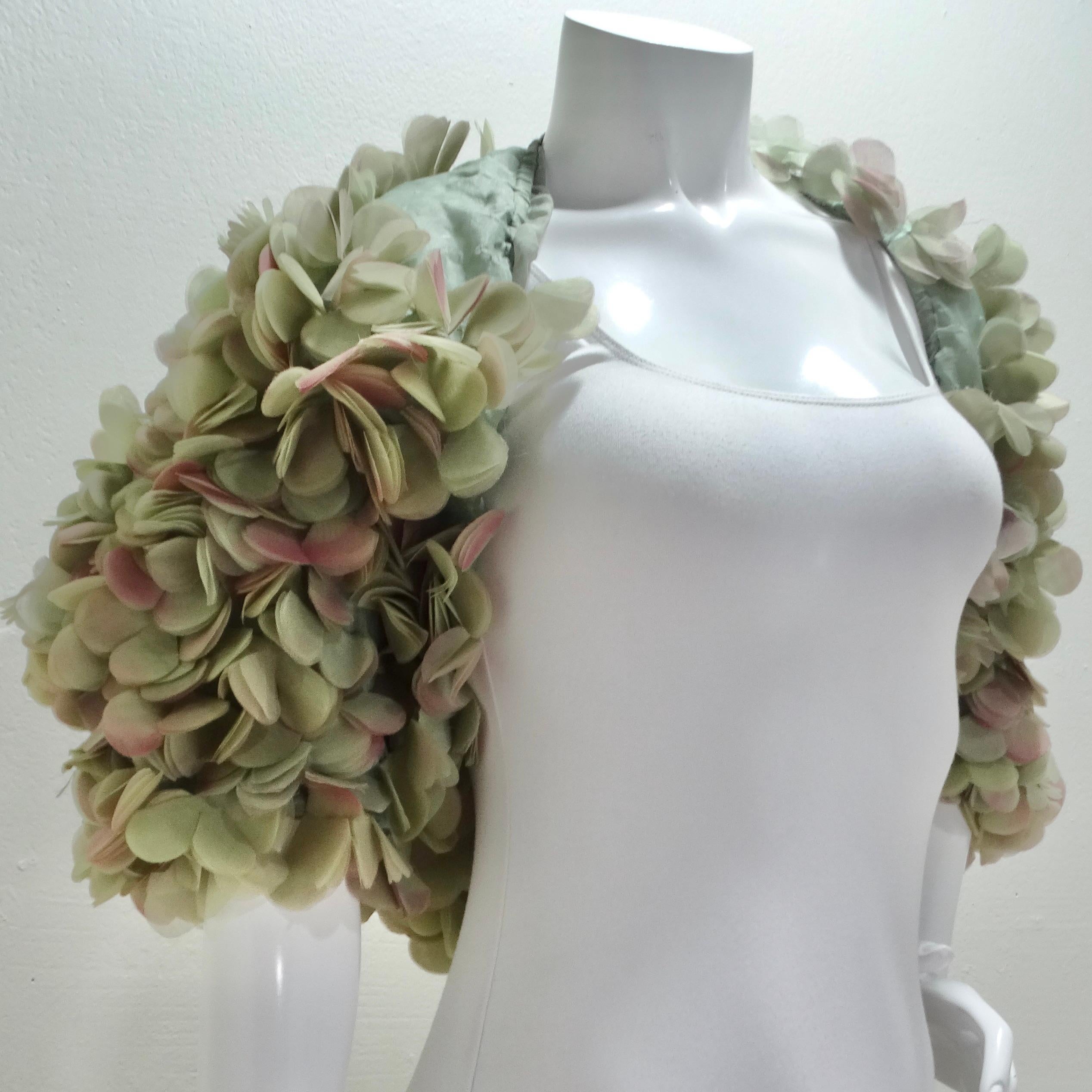 Introducing a Fashion Flashback: 1990s Randolph Duke 3D Flower Petal Applique Bolero Shrug! Step into the world of vintage glamour with our exquisite Randolph Duke bolero shrug. Crafted in the iconic 1990s style, this bolero showcases the