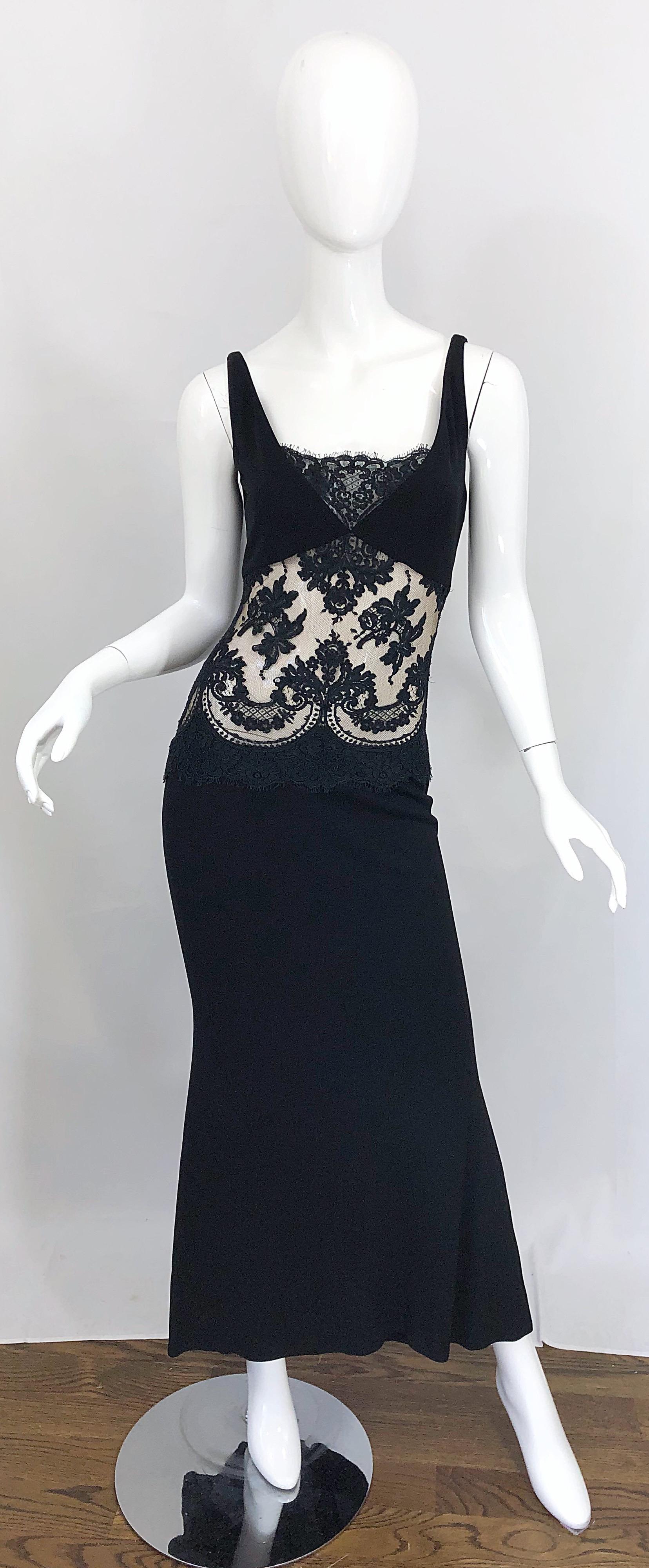 Sexy 1990s RANDOLPH DUKE Couture black cut-out evening gown dress! Features a soft double ply rayon/silk blend fabric that offers some stretch. Sheer black lace panels at front and back reveal just the right amount of skin. Tailored bodice with a