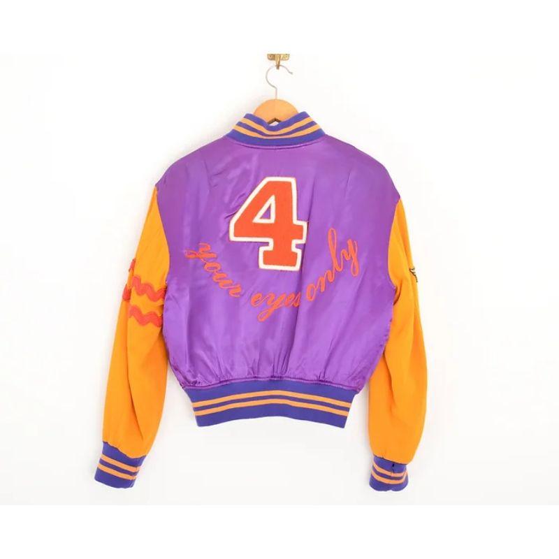 1990's Rare Moschino 'For Your Eyes Only' Satin Varsity Colourful Bomber Jacket Excellent état - En vente à Sheffield, GB