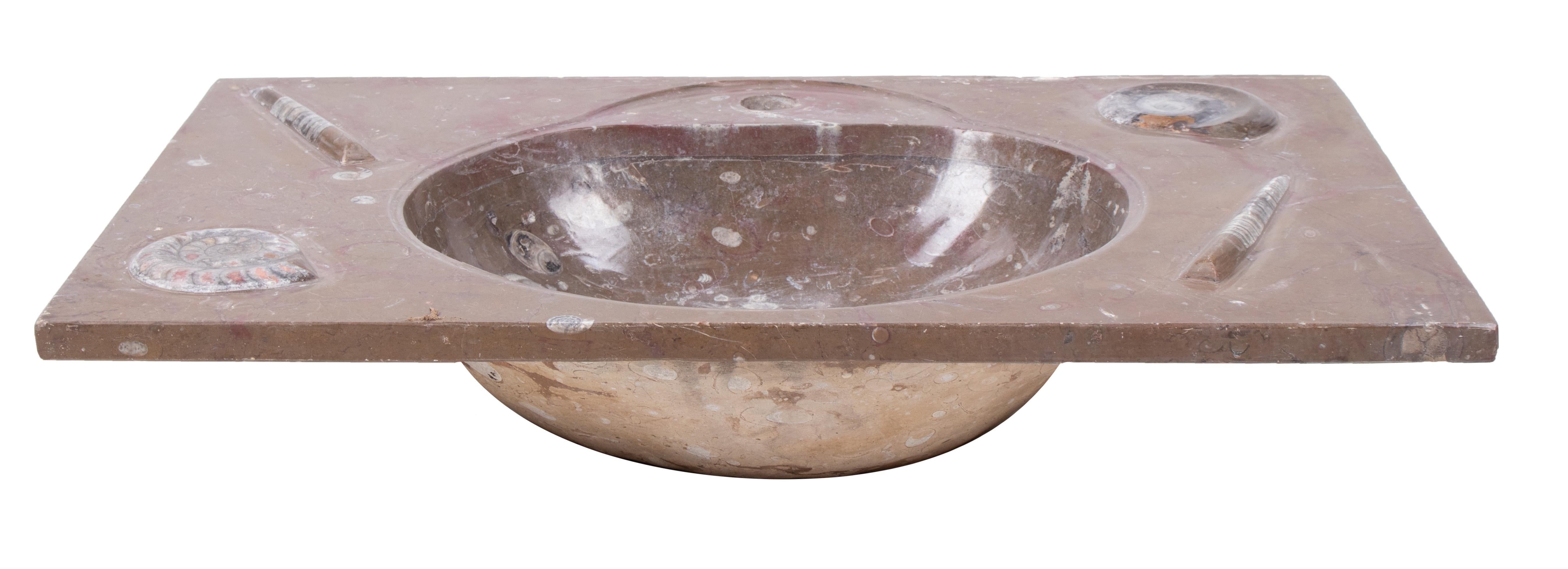 1990 red fossil limestone wash basin.