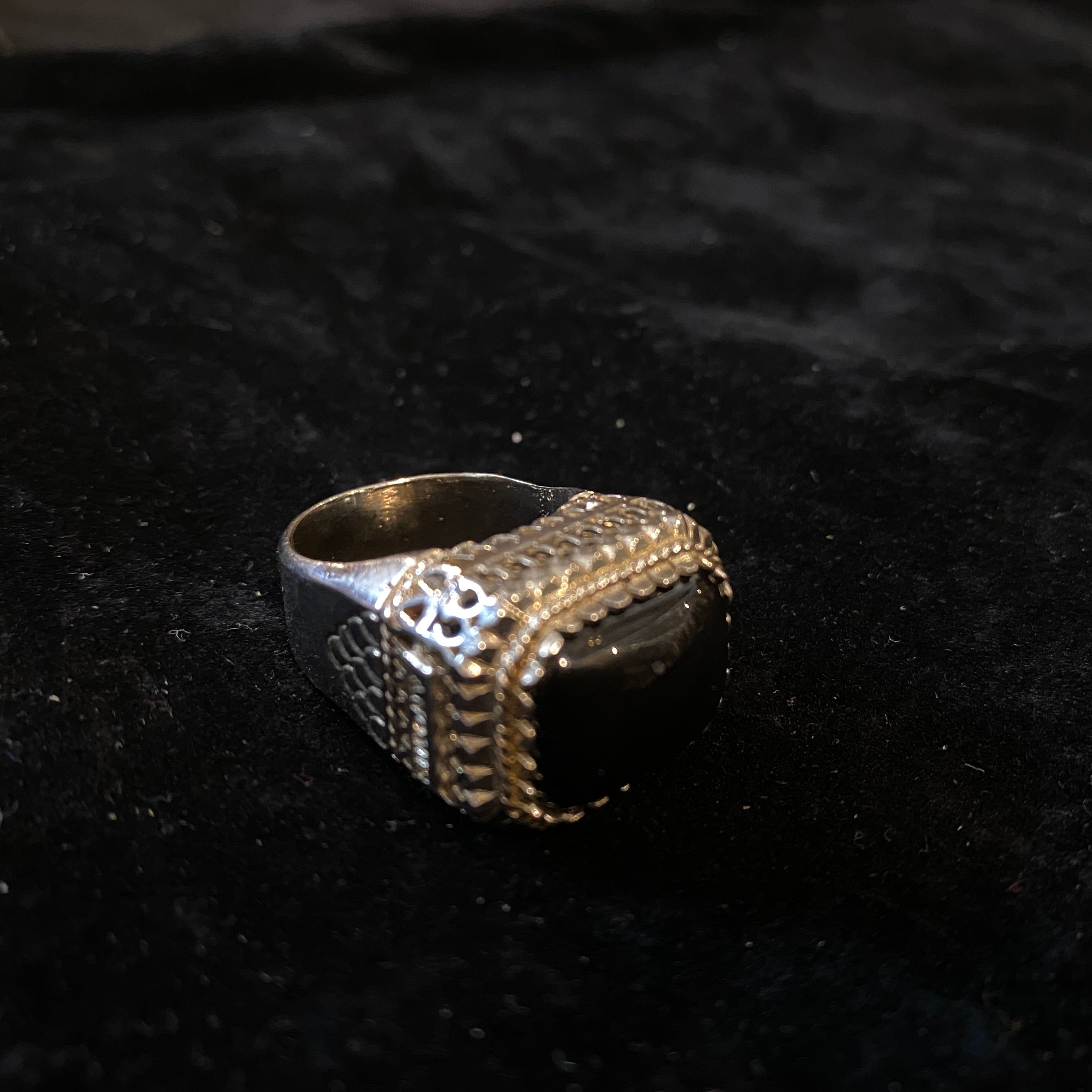 An amazing sterling silver and black onyx cocktail ring designed and manufactured in Italy by Anomis in the Nineties, the ring has never worn. The ring  consists of sterling silver, This material gives the ring a lustrous and elegant appearance.