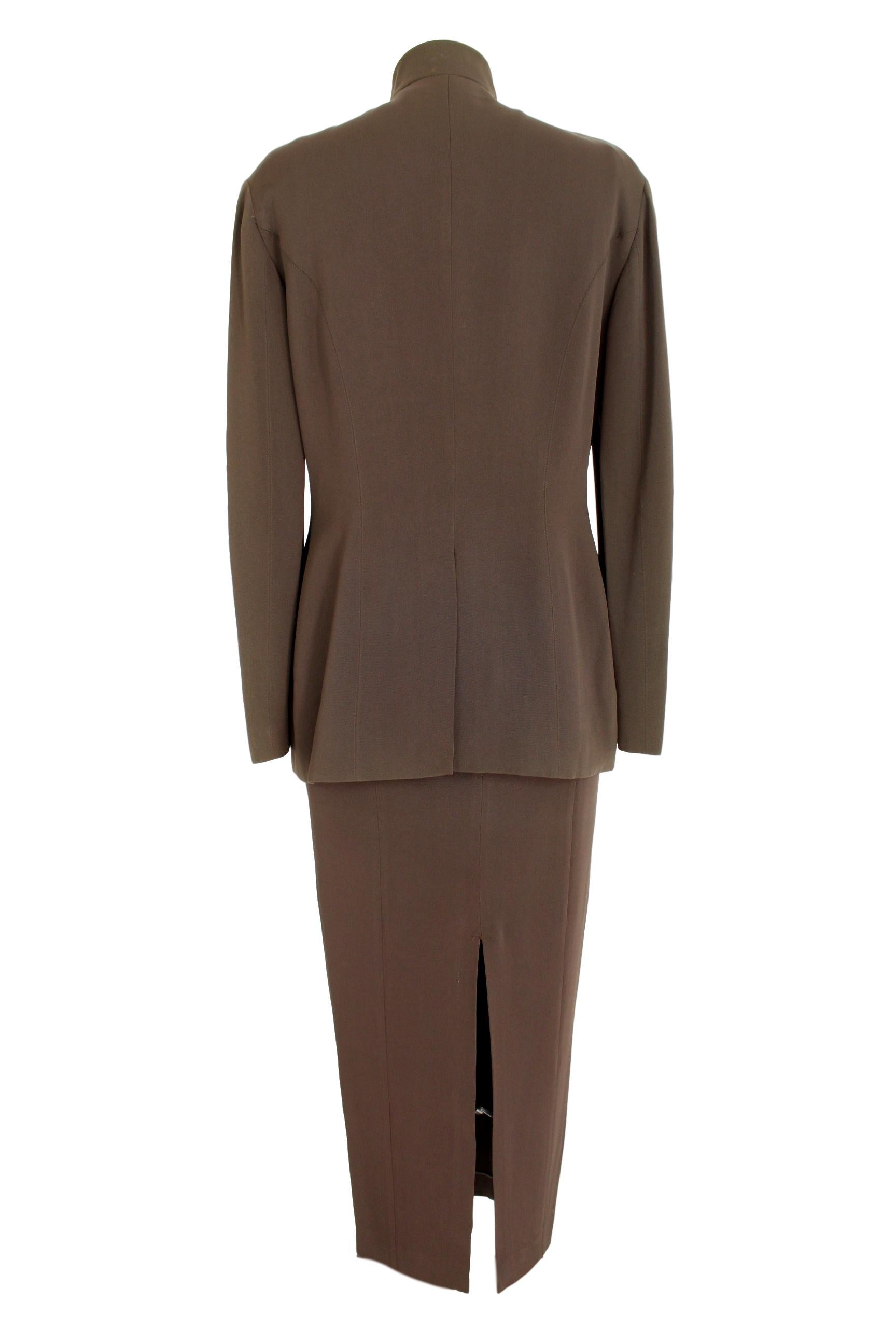 Rifat Ozbek women's vintage 90s suit dress. Jacket and dress color brown, long dress type sheath dress, 62% acetate 38% rayon. Made in Italy. Excellent vintage conditions.

Jacket size: 44 It 10 Us 12 Uk
Dress size: 42 It 8 Us 10 Uk


Jacket