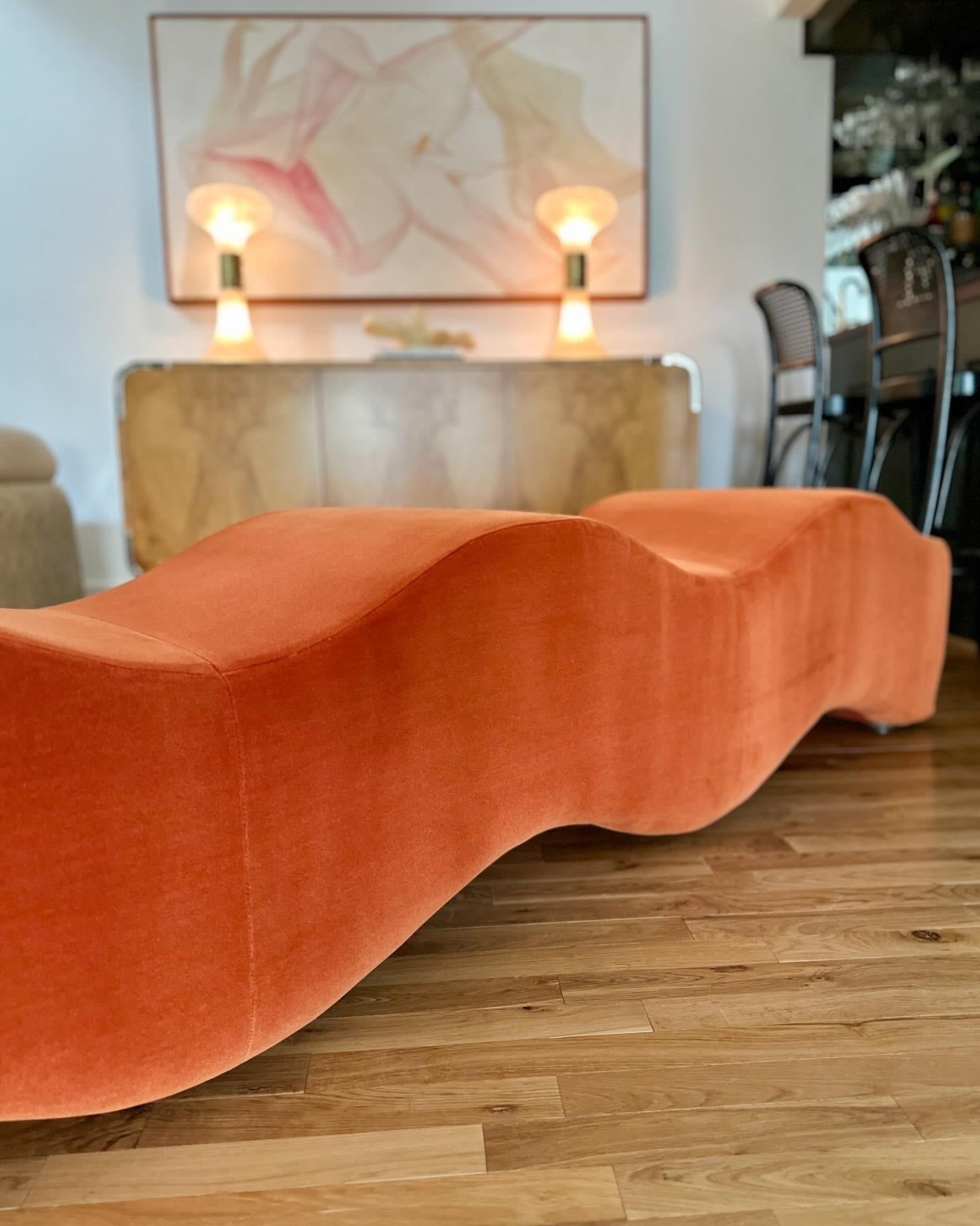 Iconic ripple bench by Laurinda Spear for Brayton International, c.1990s. Freshly reupholstered in a rich, luxurious orange Kravat mohair.

Peak height: 20
Valley height: 15.5