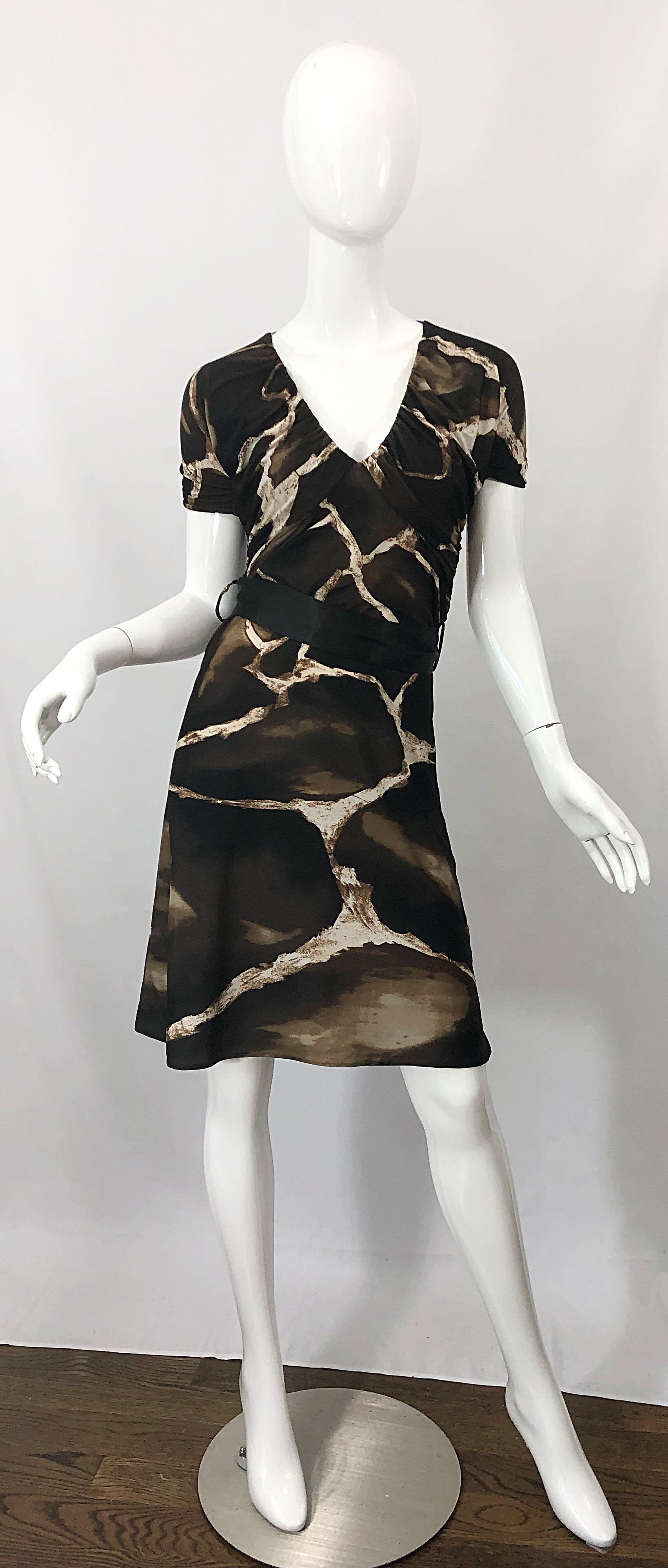 Chic and rare vintage mid / late 80s ROBERTO CAVALLI for NEIMAN MARCUS giraffe print belted short sleeve jersey dress! Features timeless giraffe animal print in chocolate brown and ivory. Flattering ruched tailored bodice and sleeves. Hidden zipper