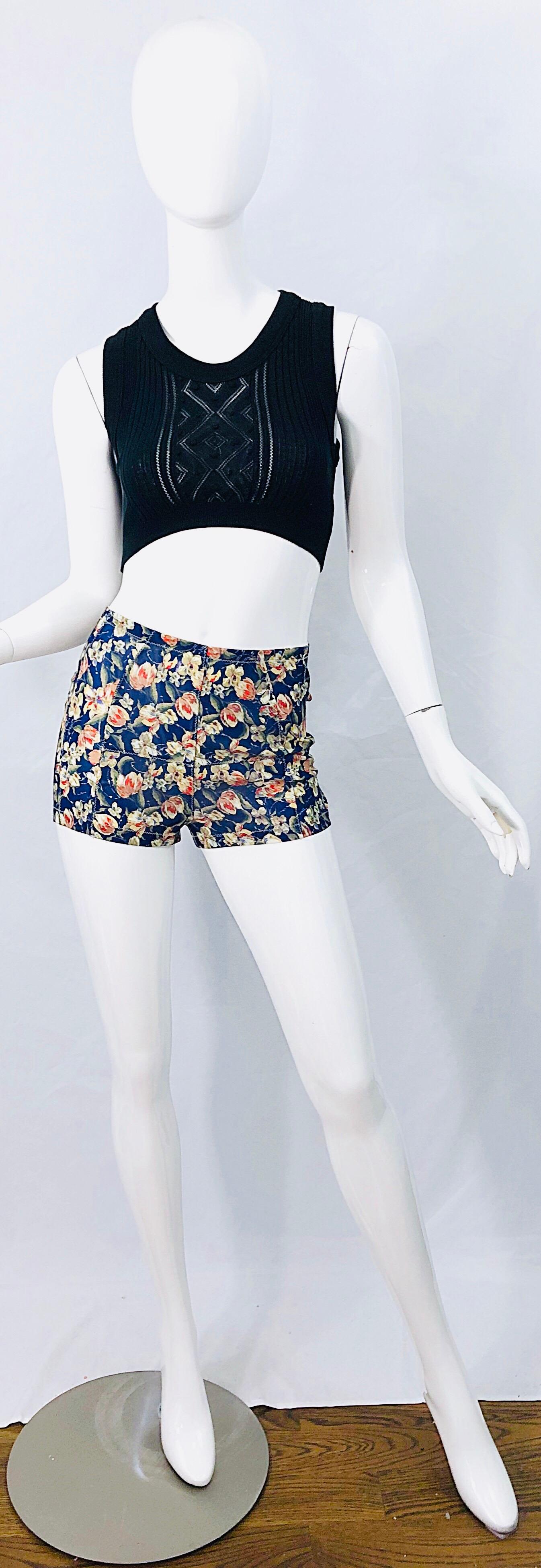 Sexy late 90s ROBERTO CAVALLI navy blue flower print mesh shorts / hot pants ! Features warm colors of orange, red, green, yellow and cream throughout. Simply slips on and stretches to fit. The pictured 90s 
Jean Paul Gaultier black crop top is also