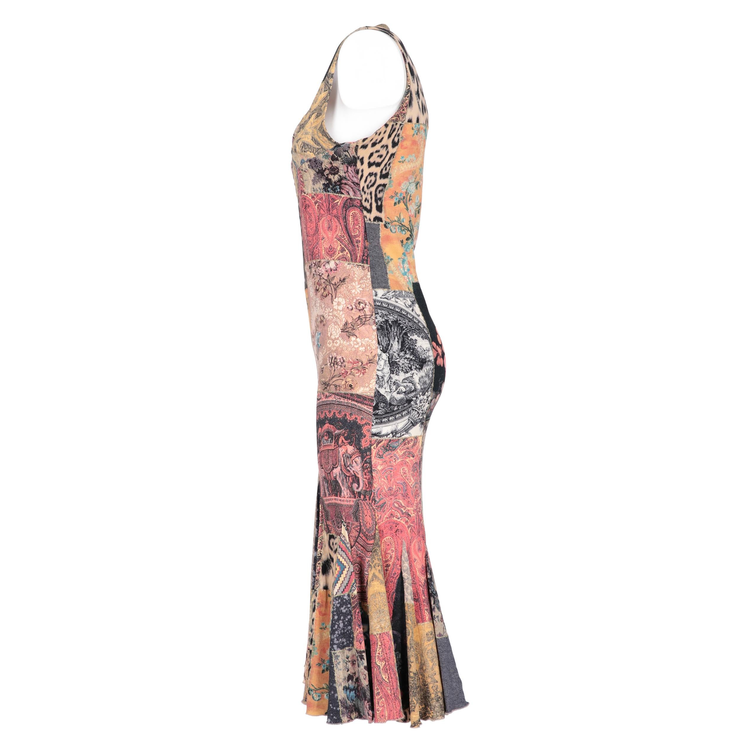 Roberto Cavalli silk blend dress with a mix of multicolored prints. Model with round neckline, sleeveless and flared skirt.
Years: 90s

Made in Italy

Size: L

Flat measurements

Height: 118 cm
Bust: 41 cm
