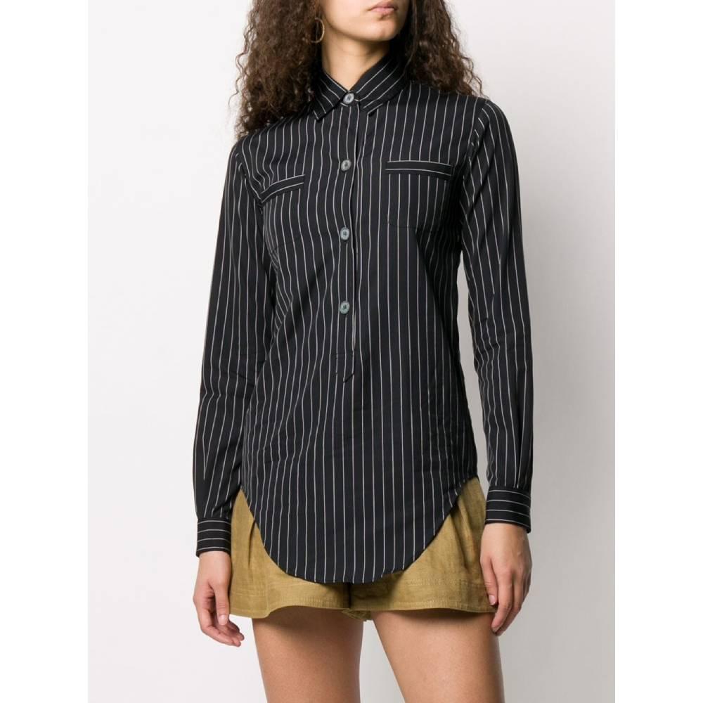 Romeo Gigli black pinstripe shirt. Classic collar and cut-out detail on the back. Front buttoning, long sleeves and buttoned cuffs. Two chest pockets and curved hem. 

This item belongs to a deadstock, it has never been worn and comes with its