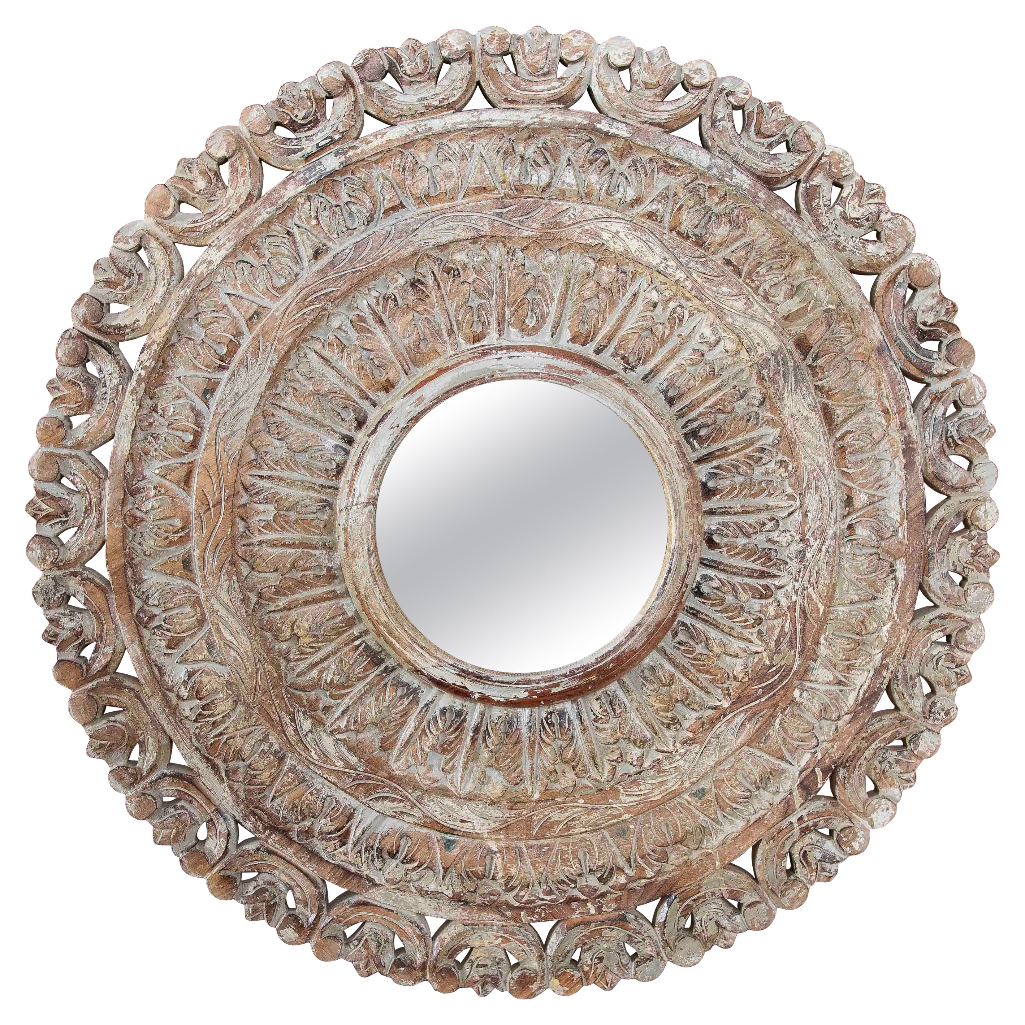 1990s Round Mirror Carved in Wood with an Aged Finish