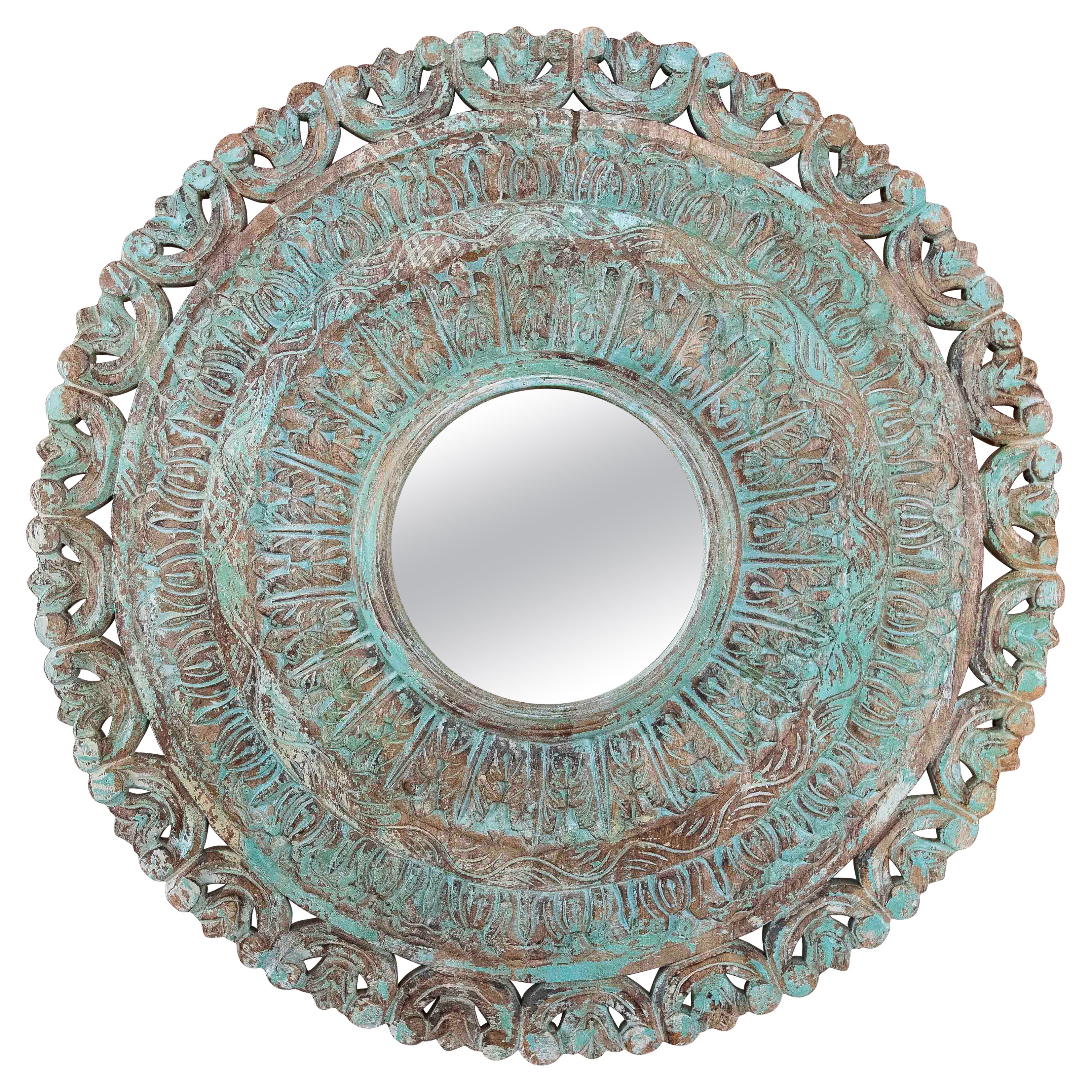 1990s Round Mirror Carved in Wood with an Aged Finish