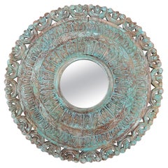 1990s Round Mirror Carved in Wood with an Aged Finish