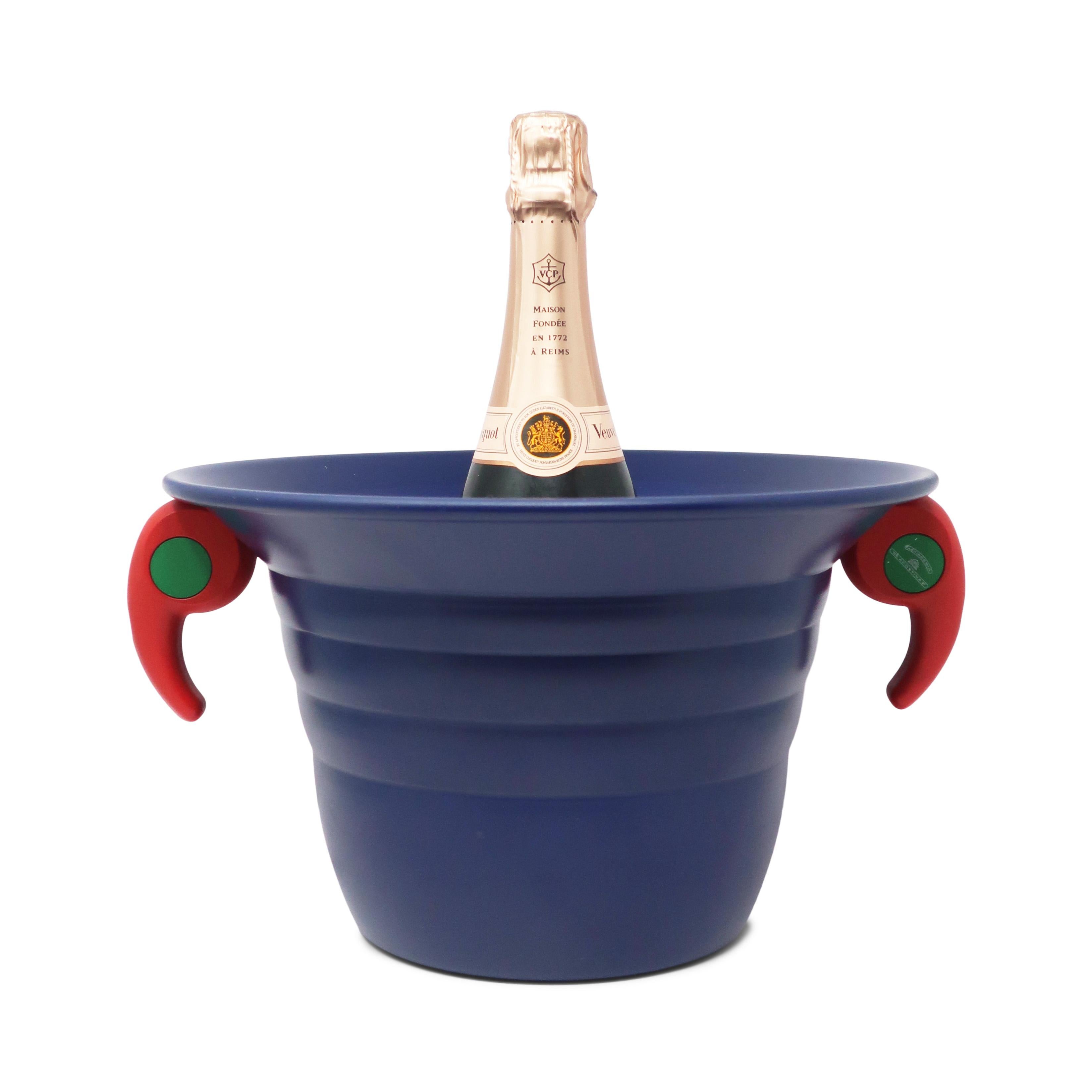 An iconic design by Gianfranco Gasparini from 1993 for Lagostina Academia, the Sally can serve as both a pasta pot and a champagne ice bucket. An obviously Memphis-inspried design it is constructed of aluminum with heat resistant plastic handles and