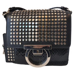 1990s Salvatore Ferragamo black python skin silver studs shoulder bag