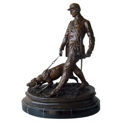 1990s Sculpture of a Hunter with a Dog in Patinated Bronze on a Base