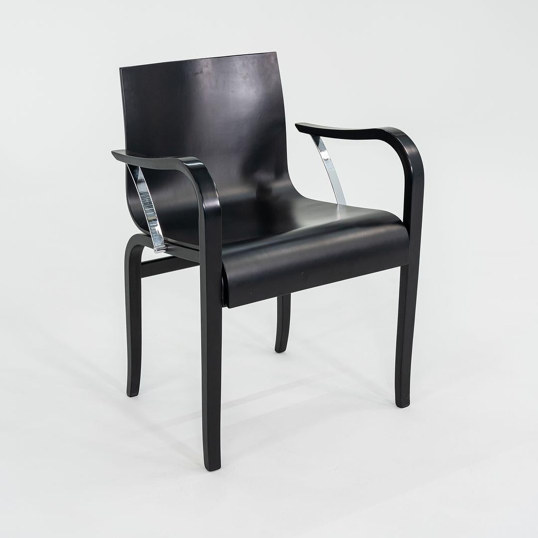 Il s'agit d'un ensemble de dix chaises de salle à manger Ginotta, initialement conçues par Enrico Franzolini pour Crassevig en 1989. Les pièces ont été importées et distribuées par Knoll, et le prix indiqué comprend l'ensemble de dix pièces. Leur