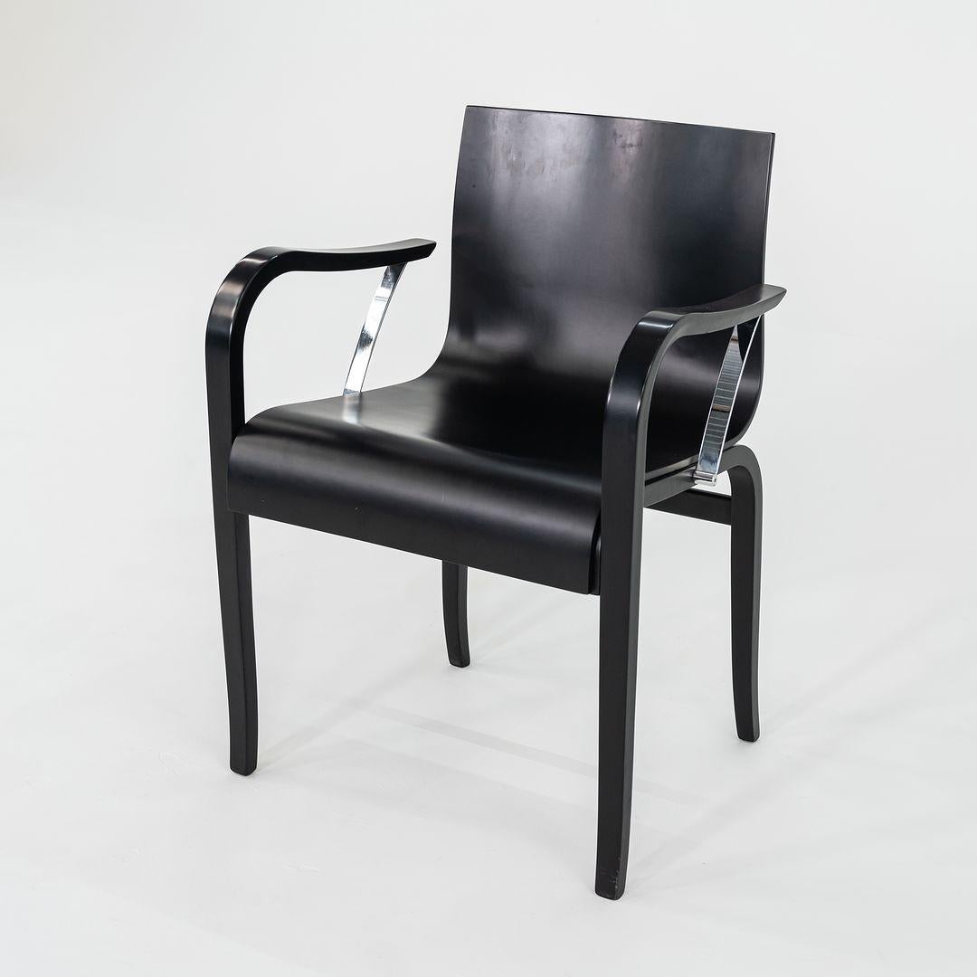 Moderne 1990 Ensemble de dix chaises de salle à manger en bois ébonisé Ginotta par Enrico Franzolini en vente