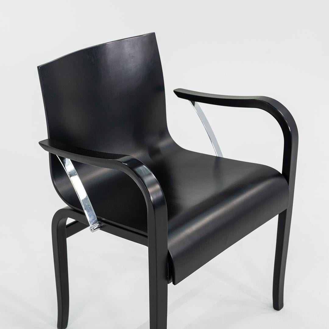 Bois 1990 Ensemble de dix chaises de salle à manger en bois ébonisé Ginotta par Enrico Franzolini en vente