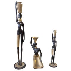 Sculture figurative in metallo