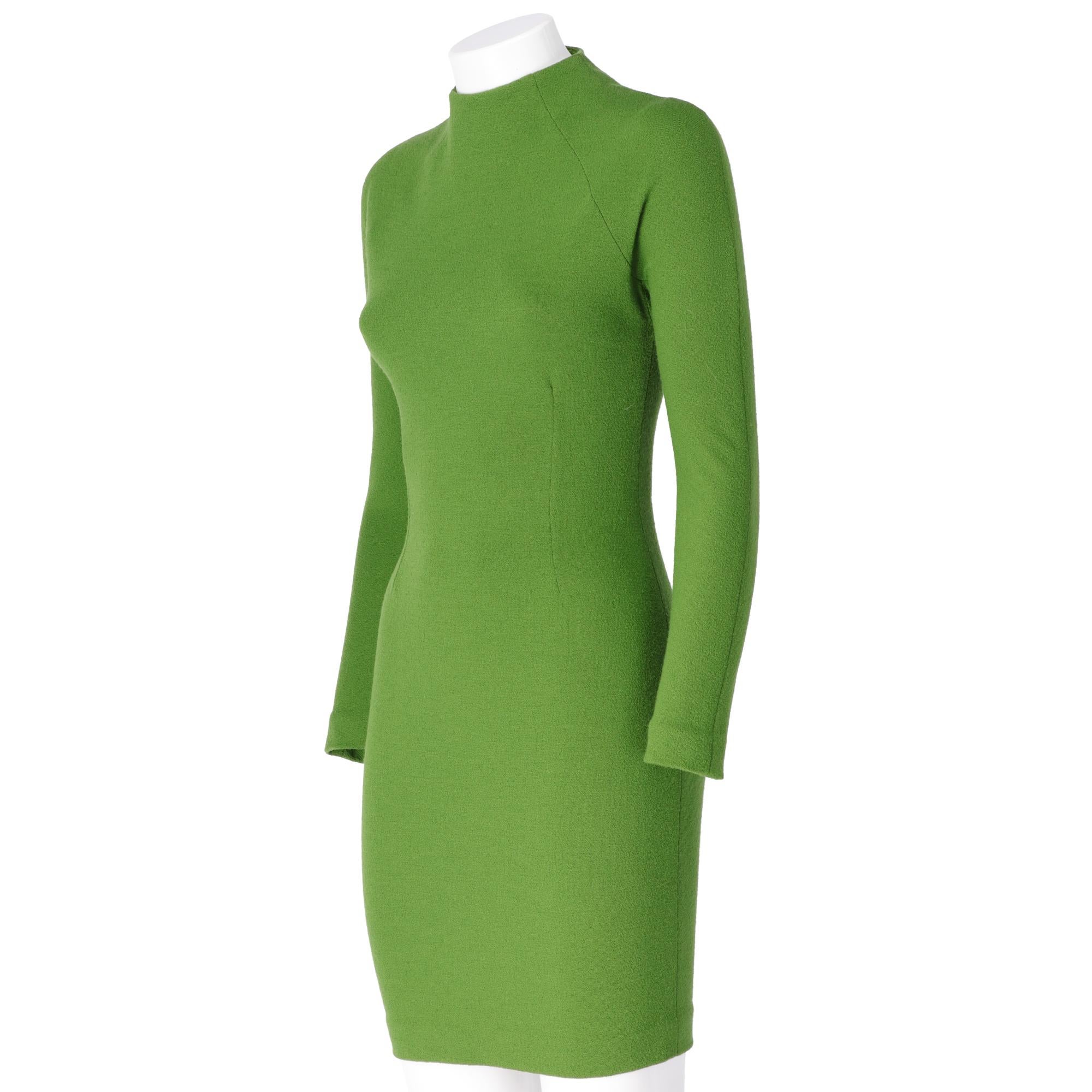 Fitted flared midi dress by Sybilla in pea green wool, round neck with zip on the back, long sleeves, decorative carving on the back.
Years: 90s

Made in Italy 

Size: 40 IT

Linear measures

Height: 88 cm
Waist: 34 cm
Shoulders: 42 cm 