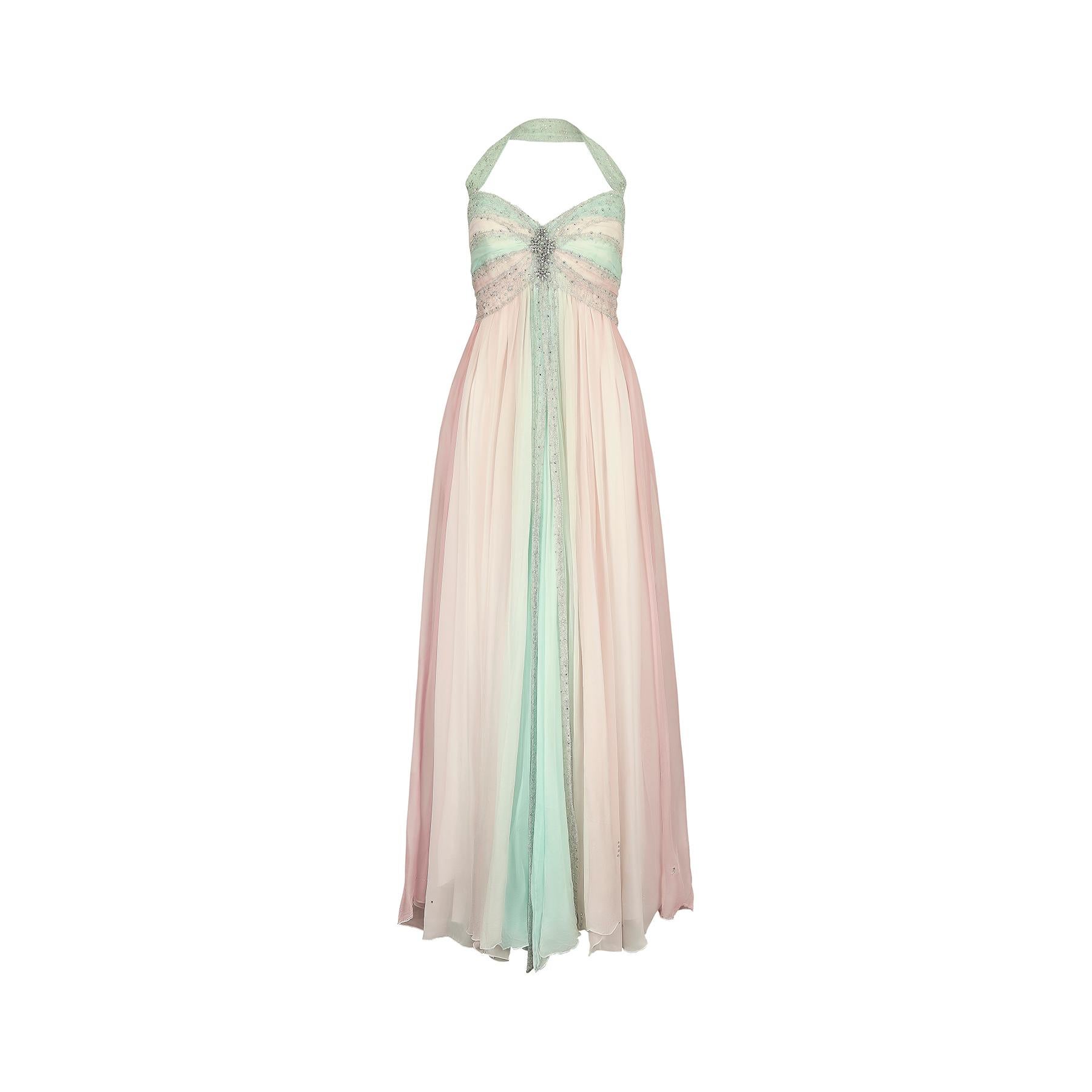 This 1990s bespoke dress reminds me of Laura Hutton's iconic Halston dress that she wore to the 1975 Academy Awards. In fabulous pastel hued shades of pink and turquoise silk chiffon, this halterneck dress has a sweetheart shaped neckline and is