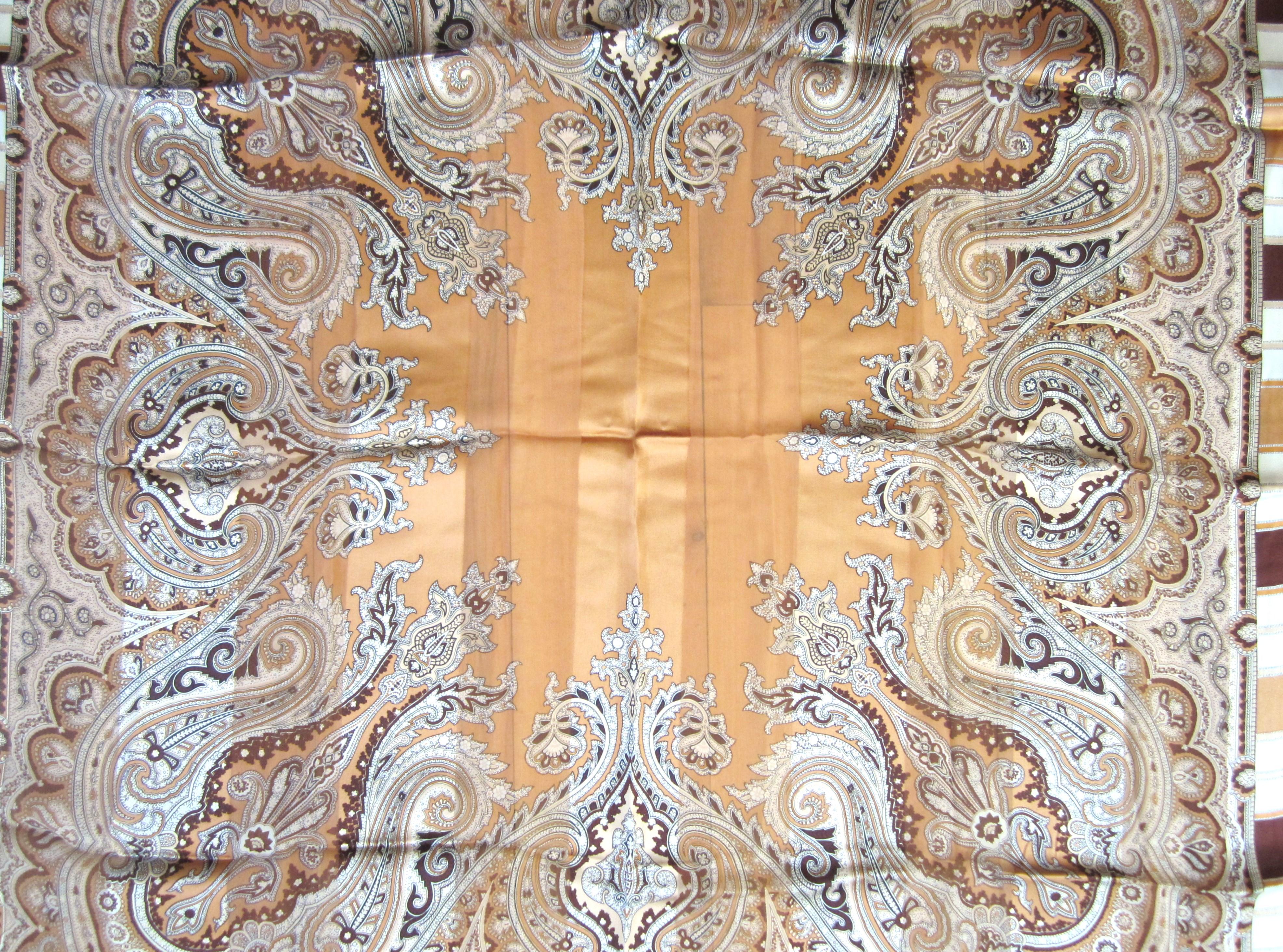 Silk Escada Scarf in a lovely brown paisley motif. Purchased in the late 1980s early 90s at Neiman Marcus. Measuring 36 x 36 Stored away till now, never worn. We have a vast inventory of scarves on our storefront. This is out of a massive collection