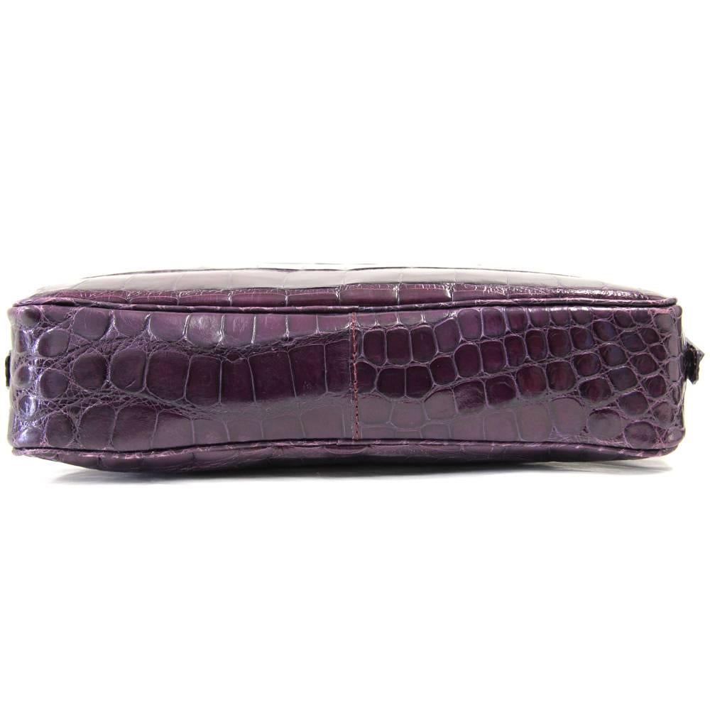 purple crocodile purse