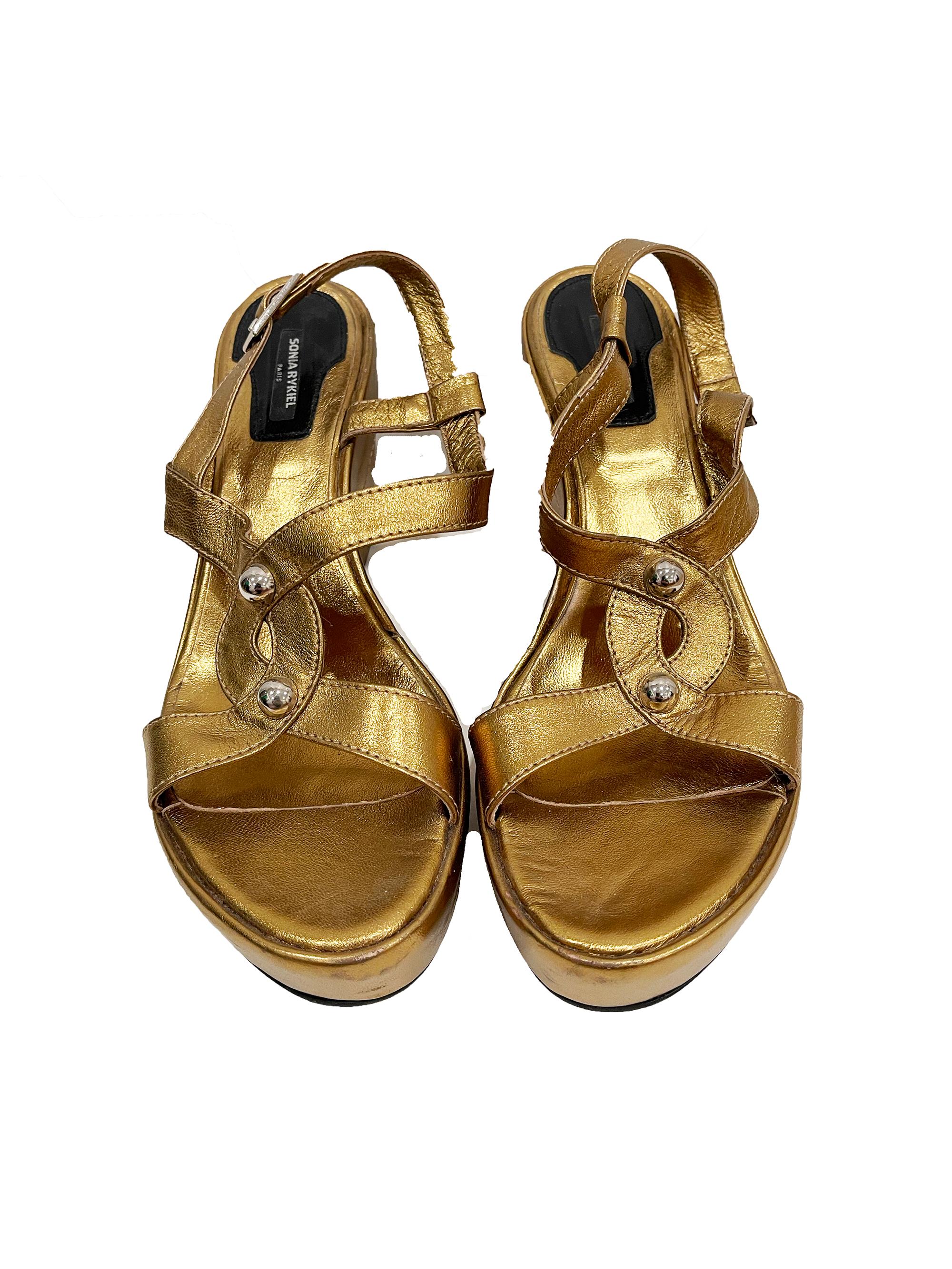 1990s Sonia Rykiel Gold Wedge Sandals
size 39 1/2
Condition; Good all over wear

