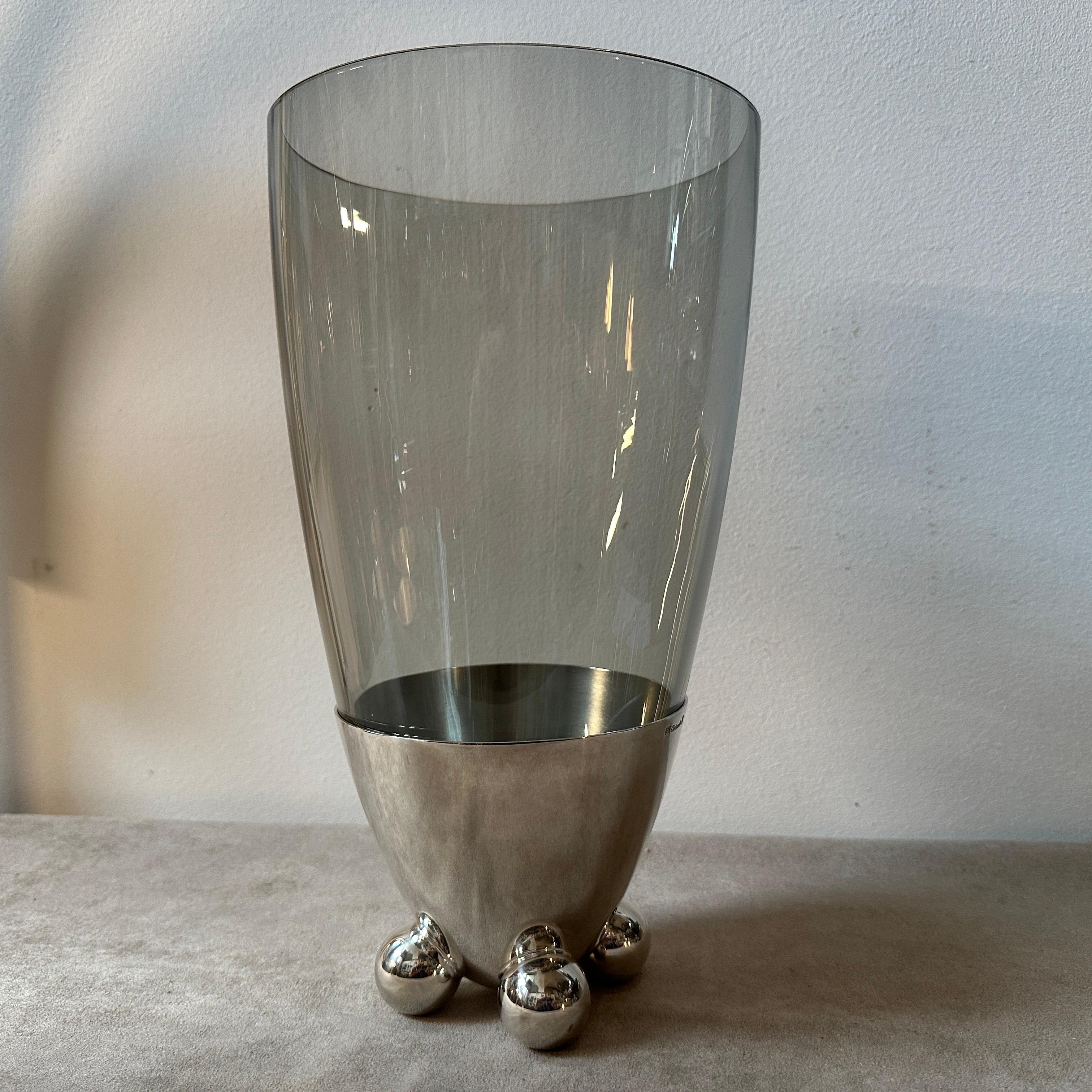 A silver plated and glass vase designed and manufactured in France by Christofle, it has never been used and it came in original box. Richard Hutten, a renowned Dutch designer known for his innovative and playful approach to design, collaborated