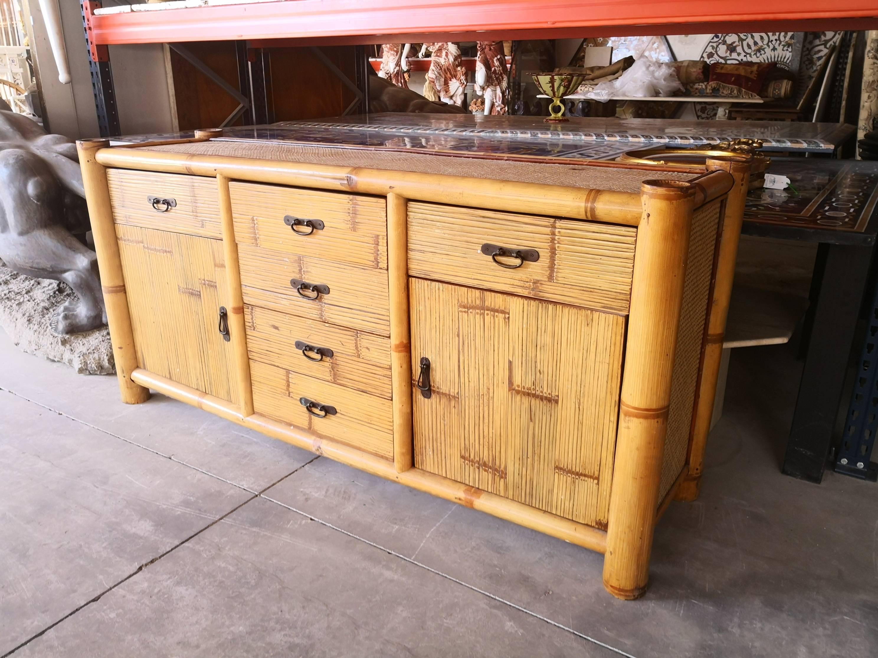 Fantastic 1990s Spanish bamboo and rattan sideboard with six drawers and two side doors.
 