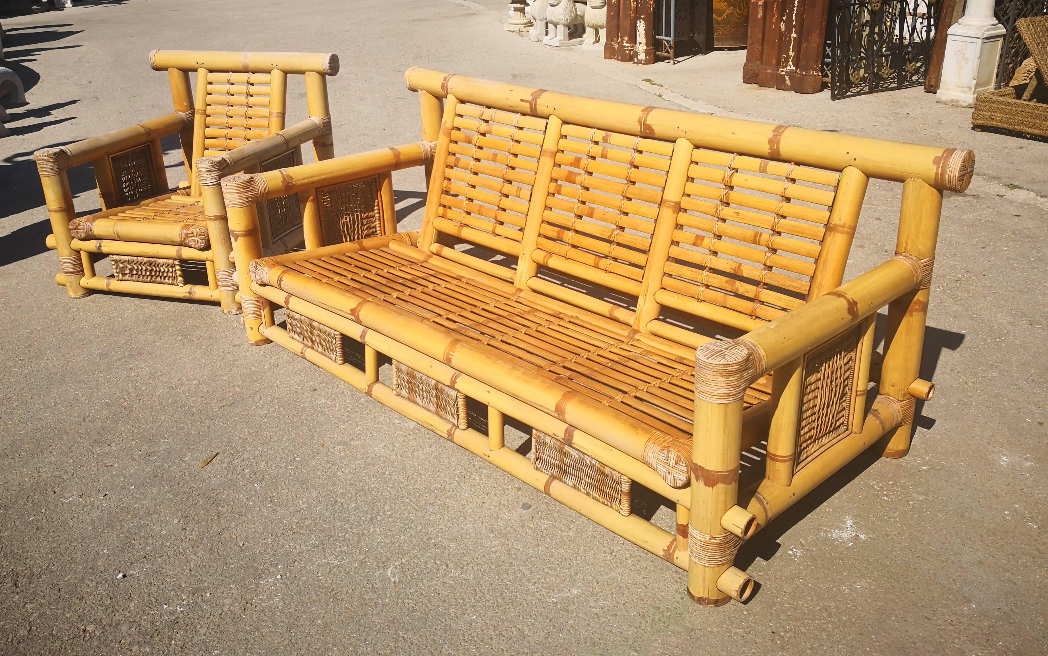 1990s Spanish bamboo and rattan three-seat couch and sofa chair. 

Couch dimensions: 89 x 220 x 100
Sofa chair dimensions: 89 x 93 x 93.


 