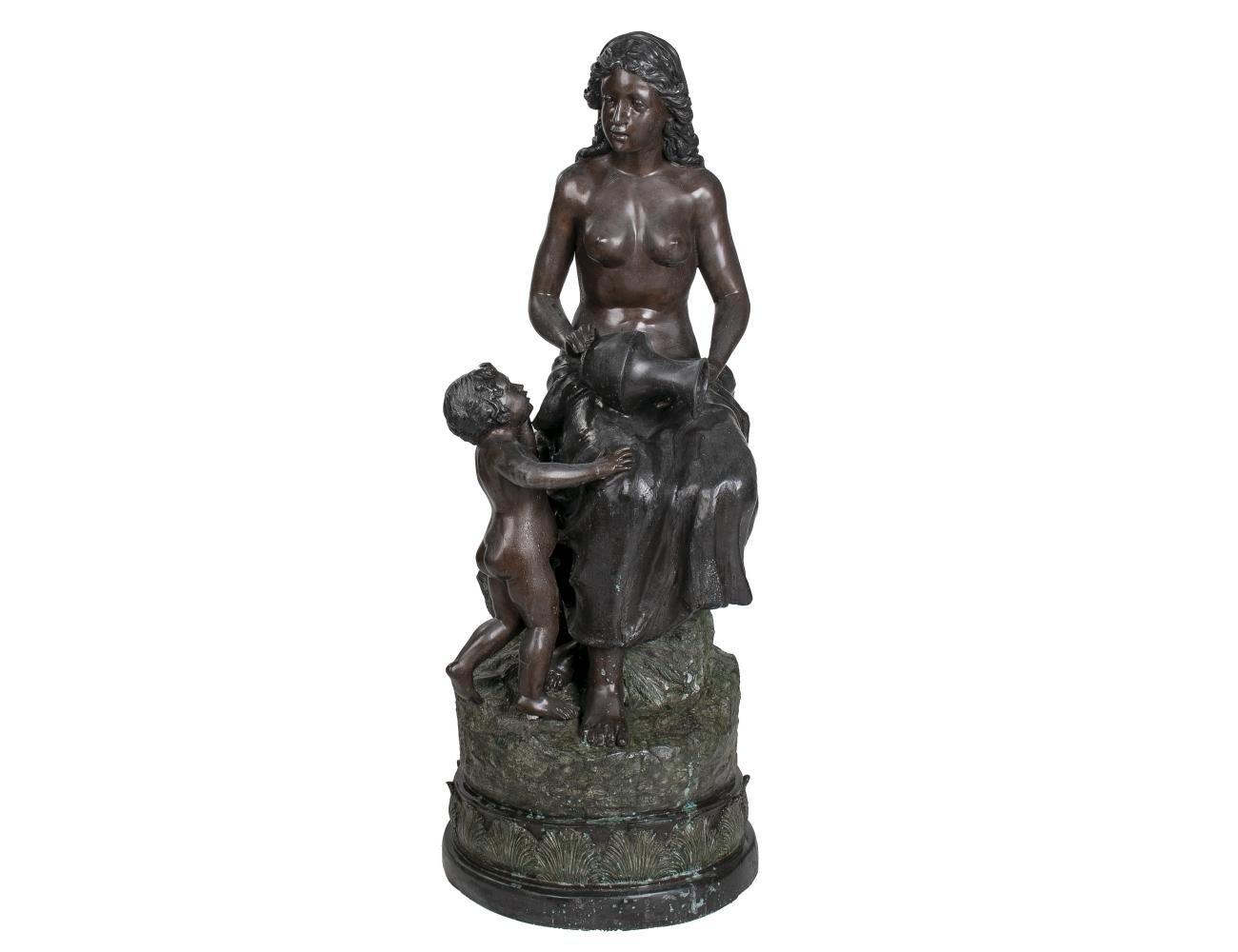 1990s Spanish cast bronze woman with boy and holding a vase figure sculpture.