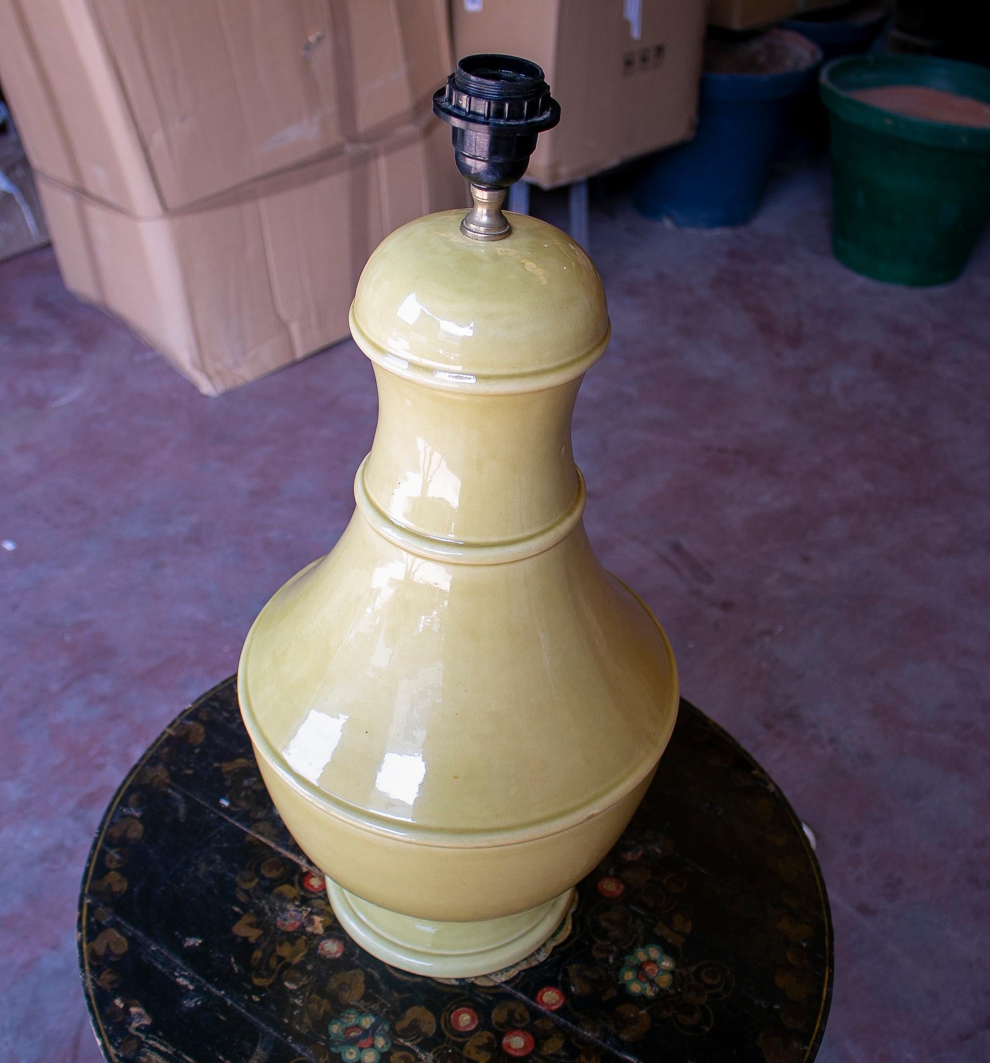 Vintage 1990s Spanish glazed terracotta ceramic yellow table lamp.