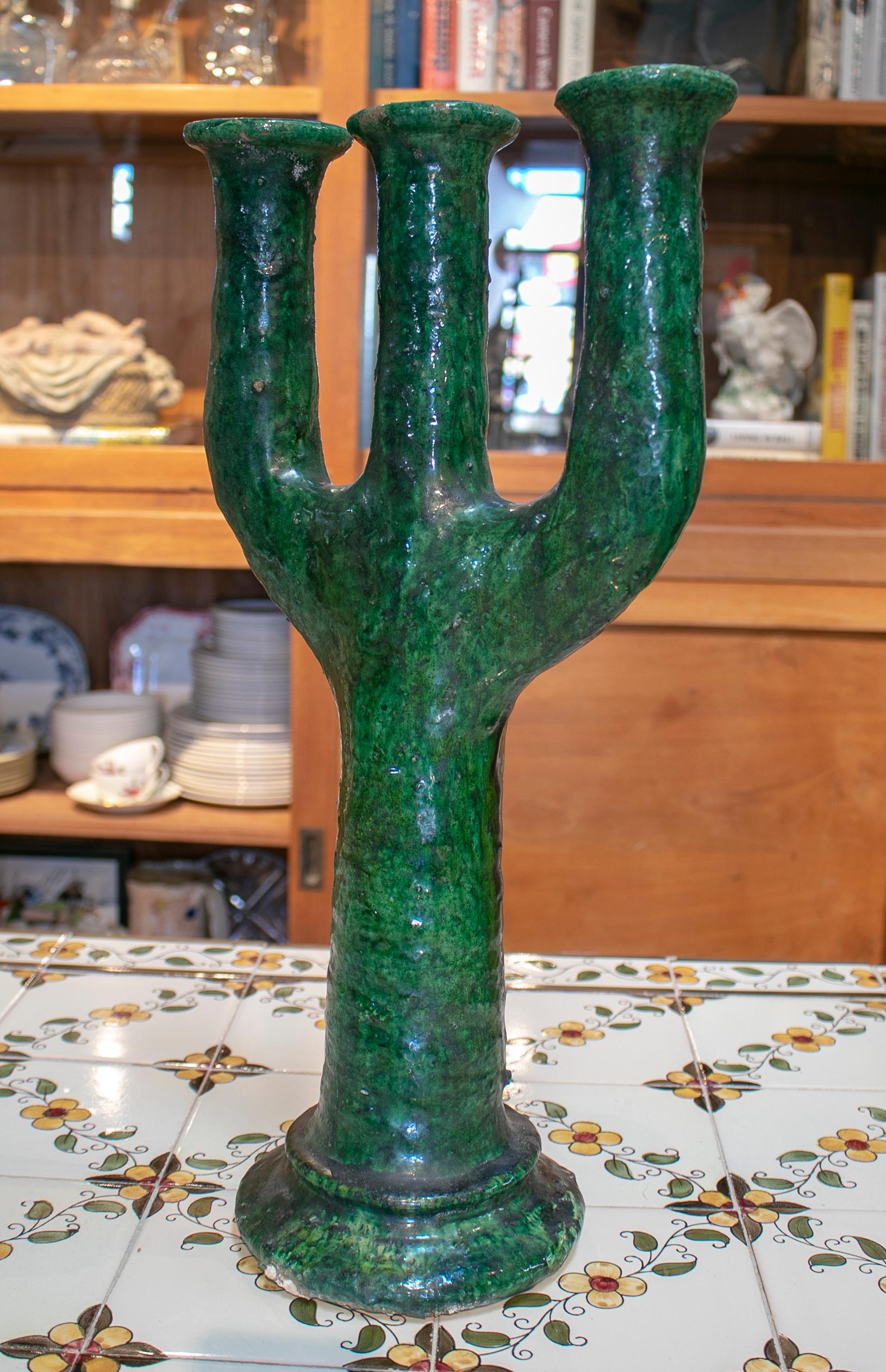 1990s Spanish green glazed ceramic terracotta candlestick.

