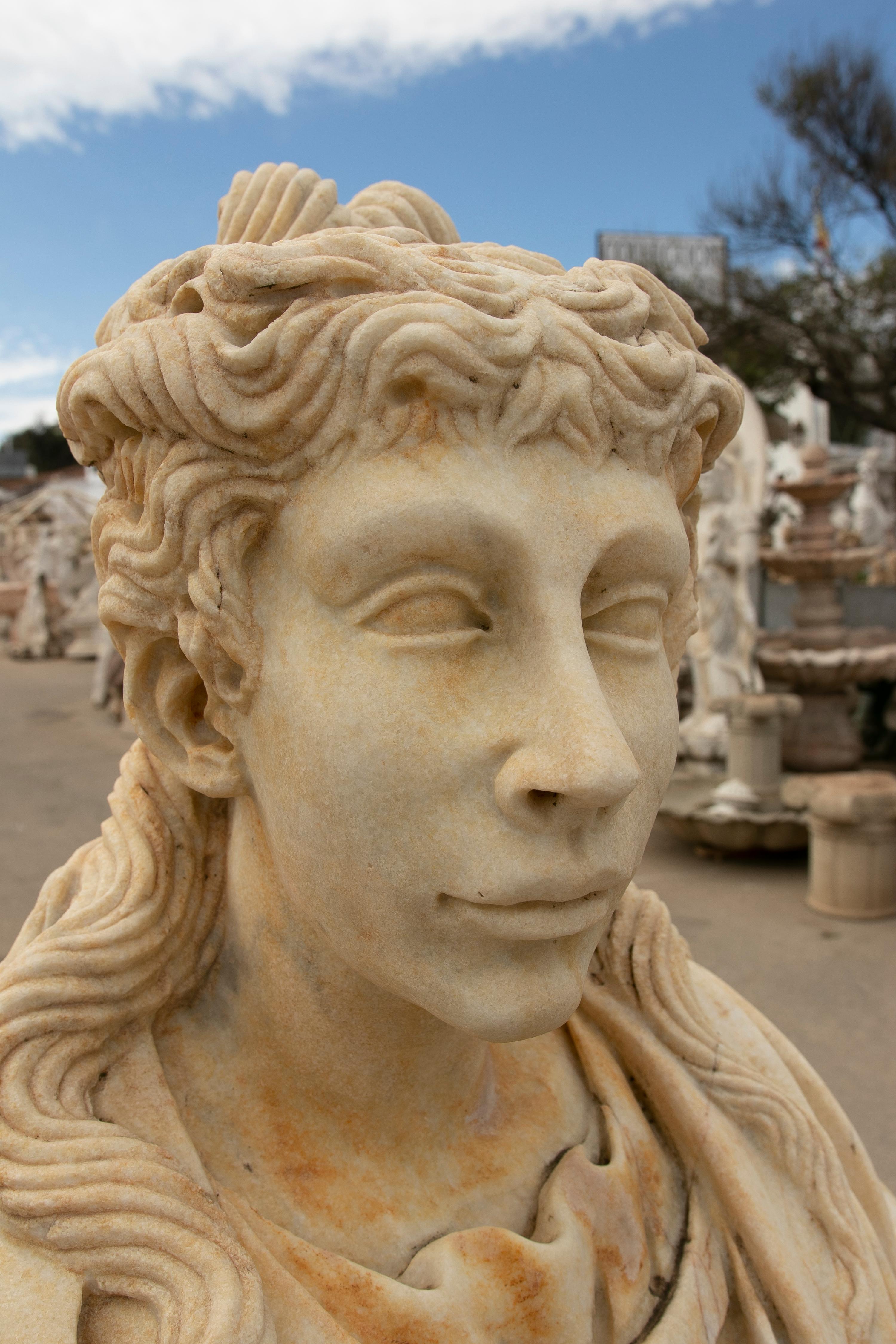 1990s Spanish Hand Carved Aged Macael White Marble Bust of Roman Woman w/ Stola In Good Condition For Sale In Marbella, ES